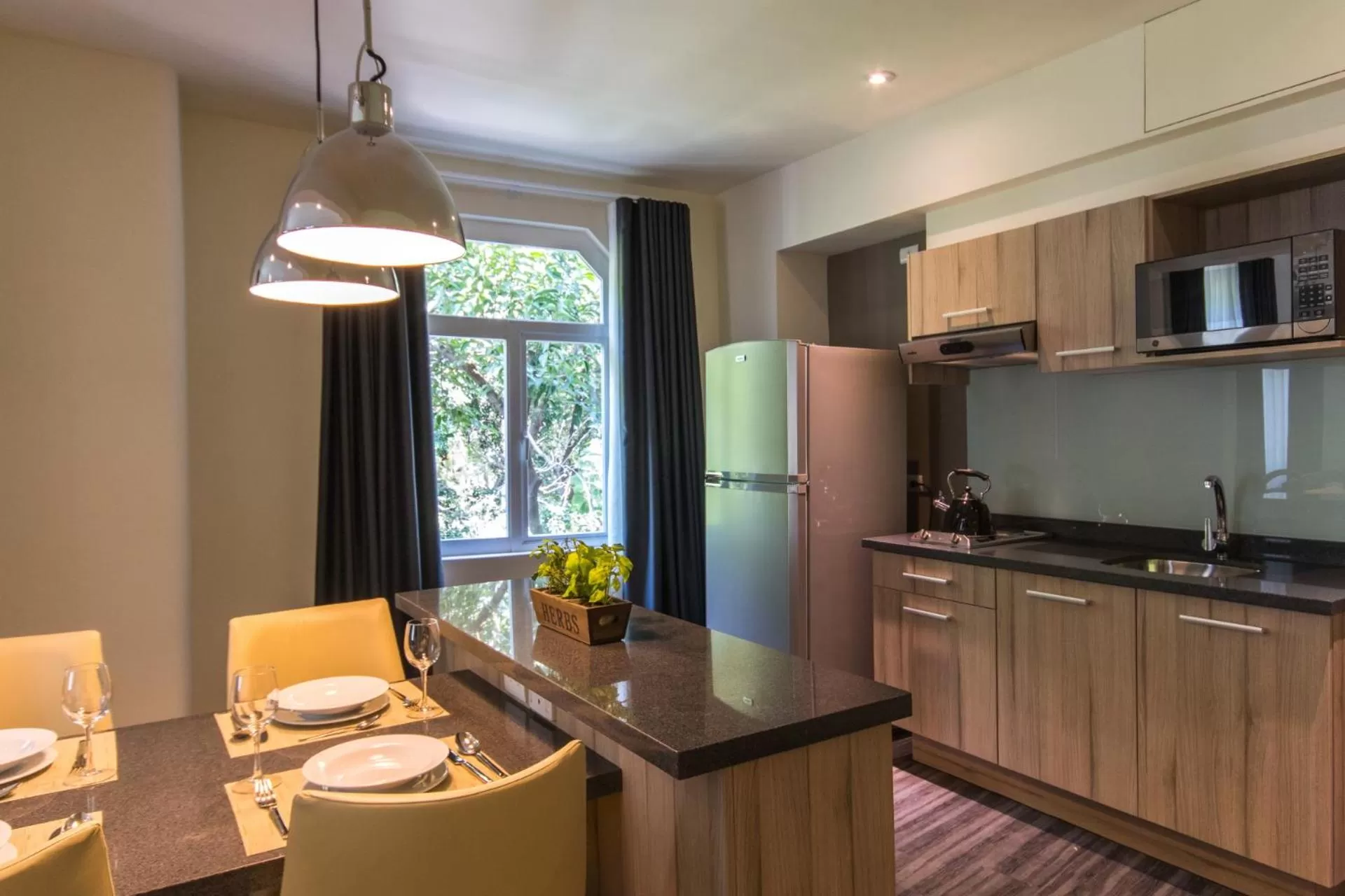 Kitchen or kitchenette in Casa Malí by Dominion Boutique Hotel