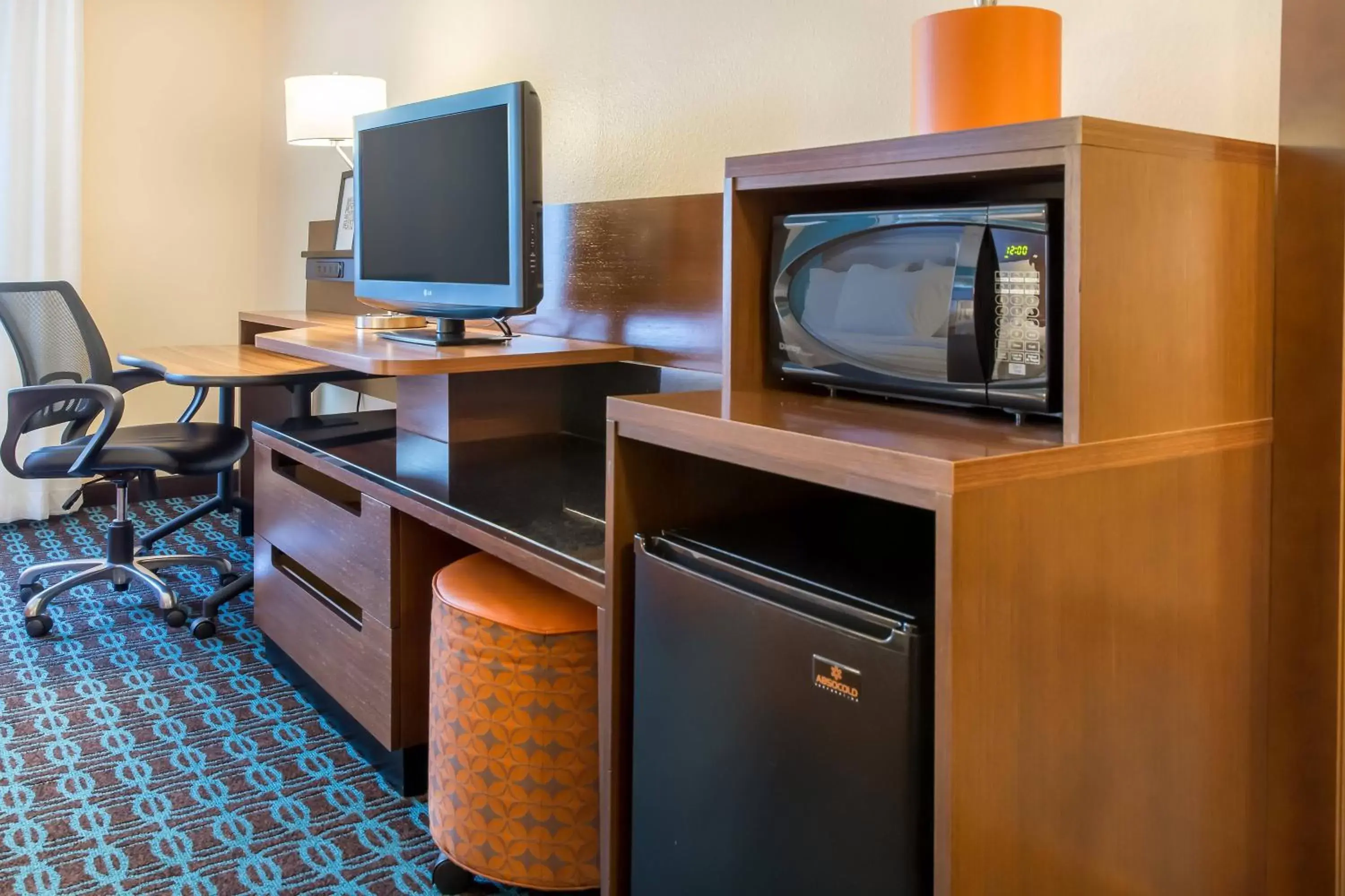Photo of the whole room, TV/Entertainment Center in Fairfield Inn & Suites Sioux Falls