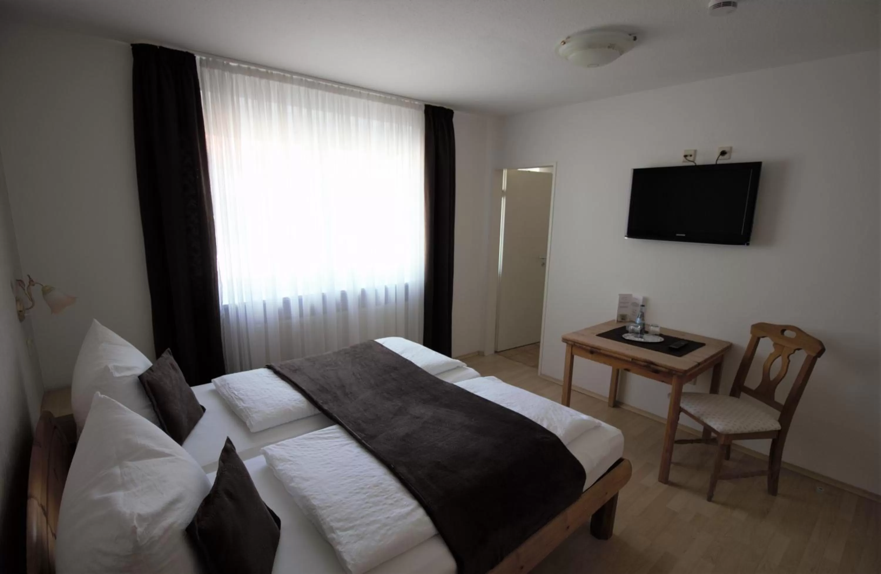 Photo of the whole room, Bed in Hotel Wirtshaus Krone