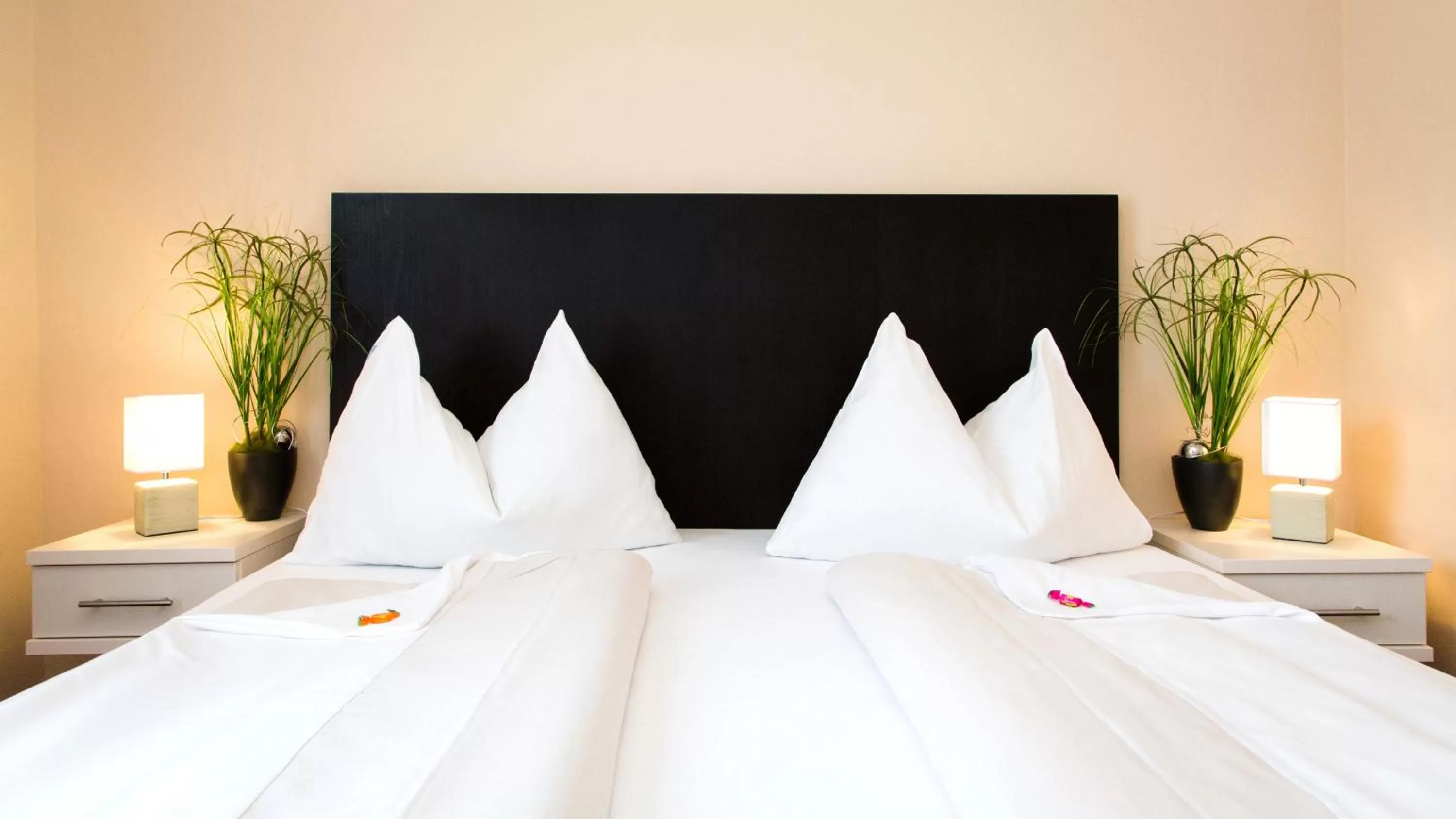 Bed in Stadthotel Kramer