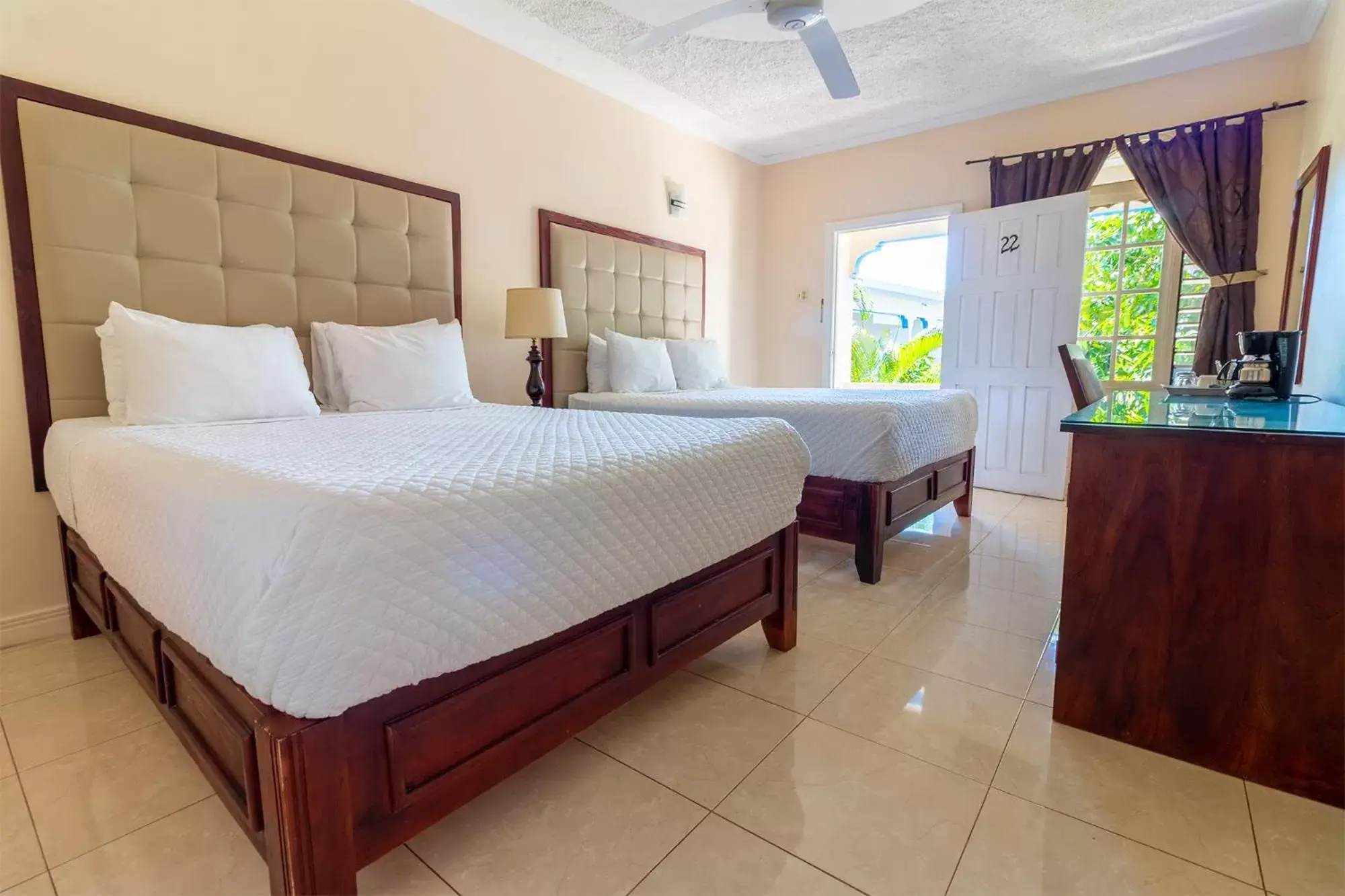 Bed in Travellers Beach Resort