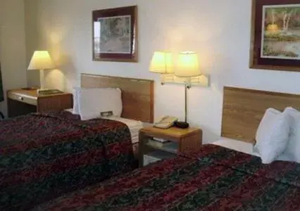 Bed in Econo Lodge Inn and Suites - Jackson