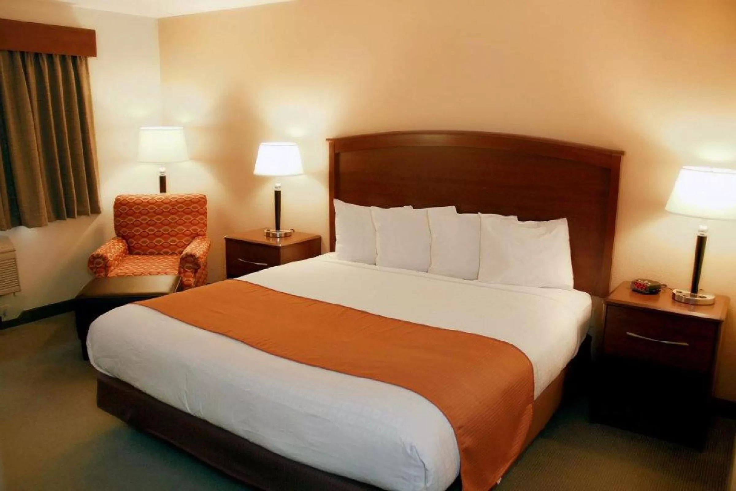 Bed in AmericInn by Wyndham Fargo West Acres