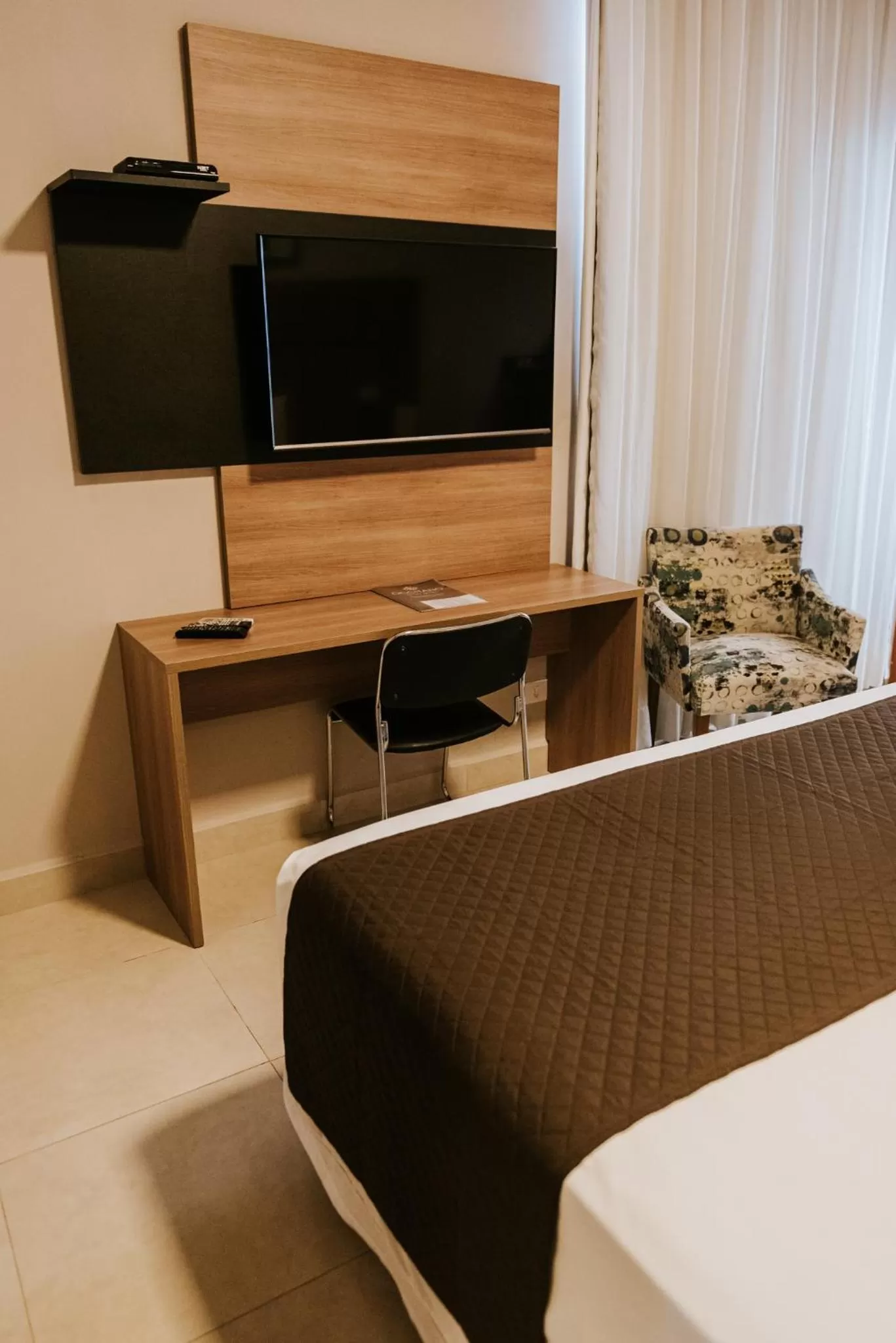 Communal lounge/ TV room in Occitano Apart Hotel