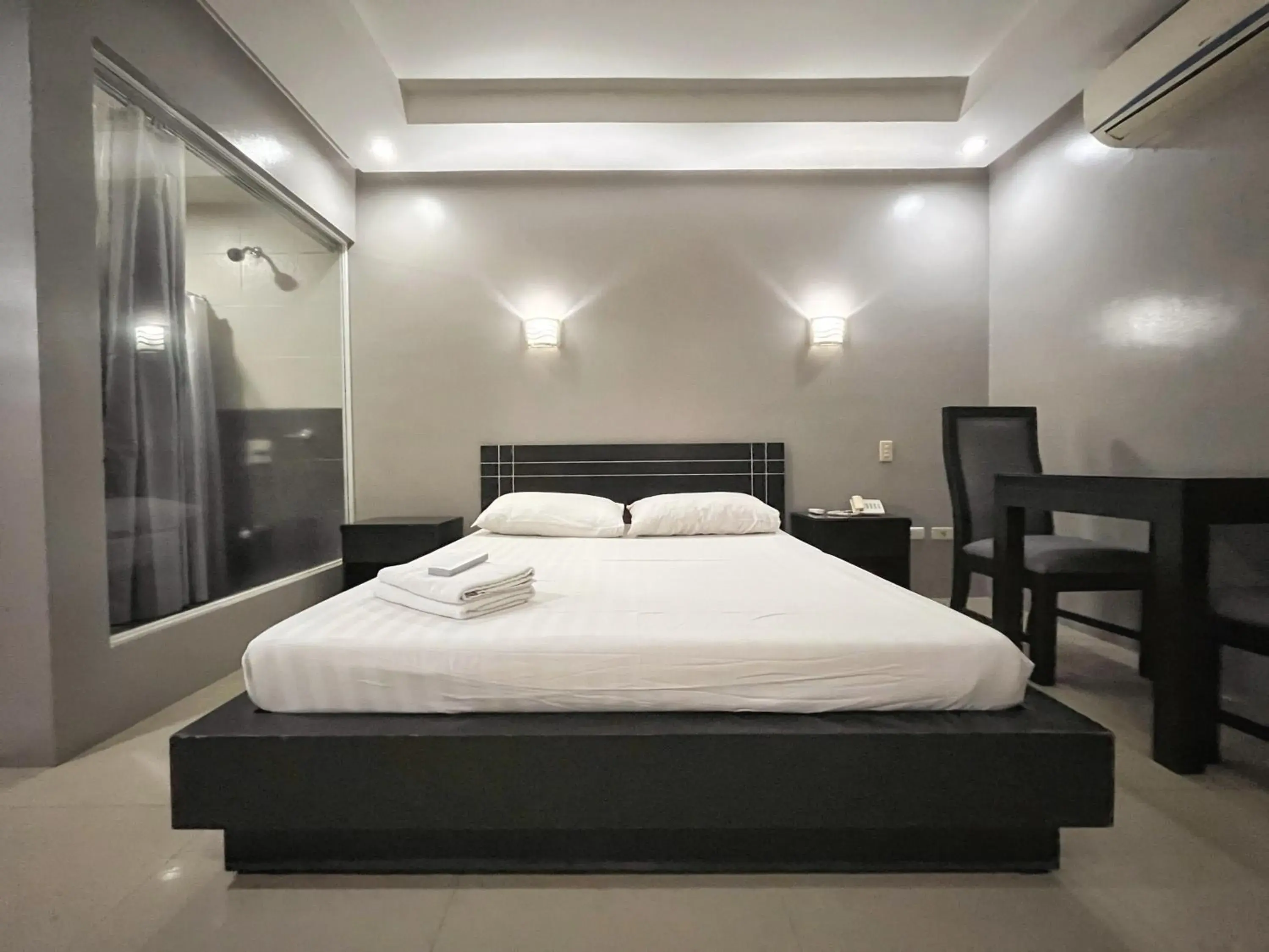 Bed in Rumi Apartelle Hotel