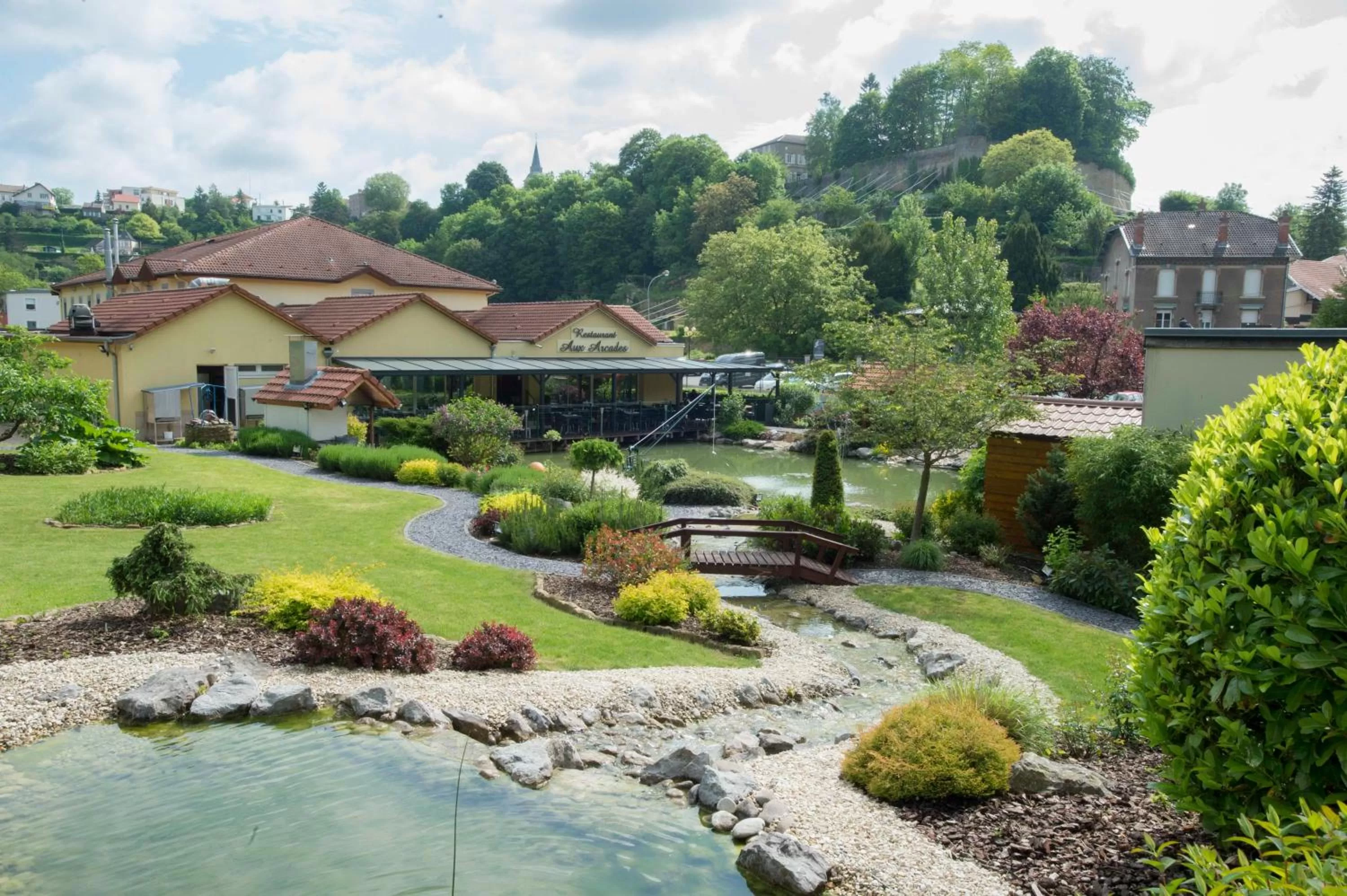Garden in Hôtel Aster Restaurant Aux Arcades