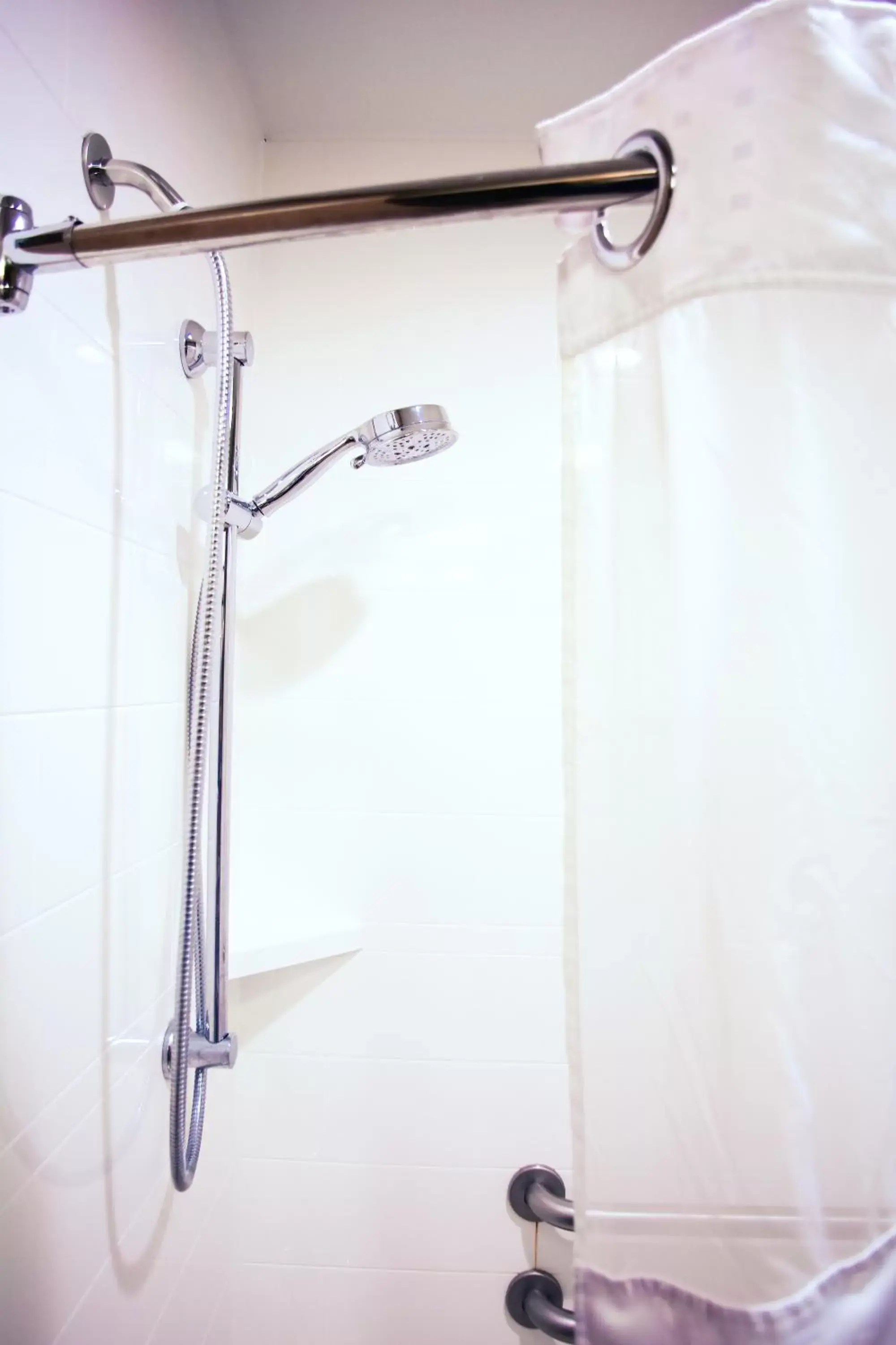 Shower, Bathroom in Holiday Inn & Suites Downtown La Crosse, an IHG Hotel