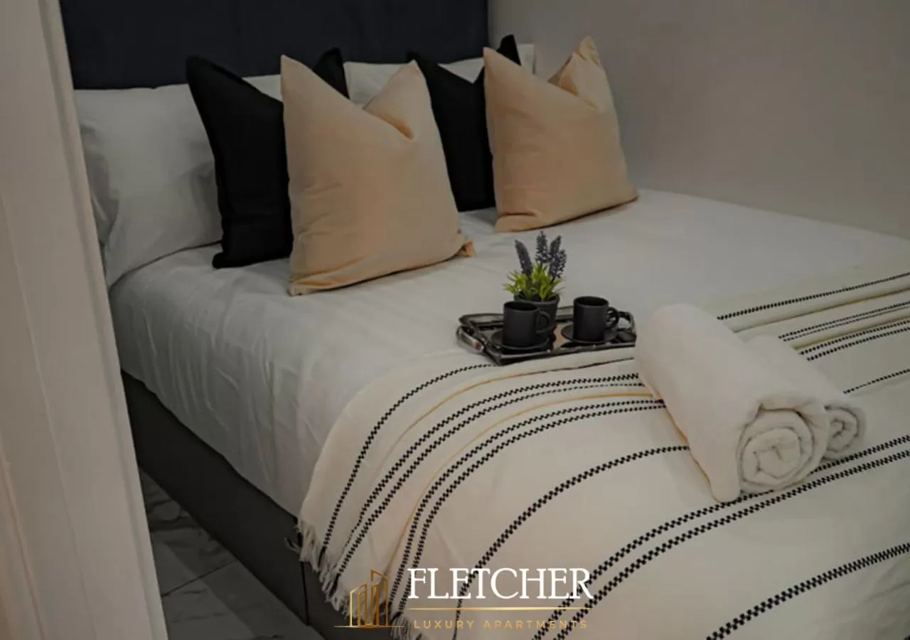 Bed in Spire Accommodations Ltd