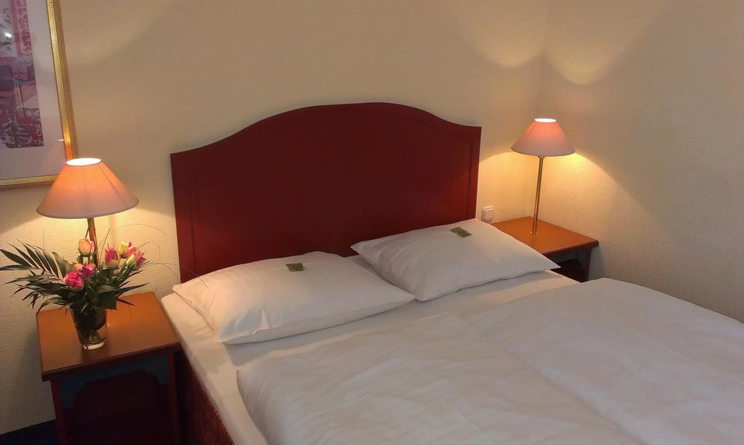 Bed in Akzent Hotel Am Goldenen Strauss