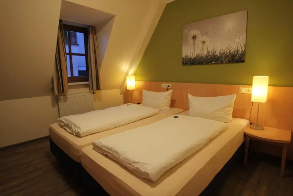 Photo of the whole room, Bed in Gasthof Weißes Roß