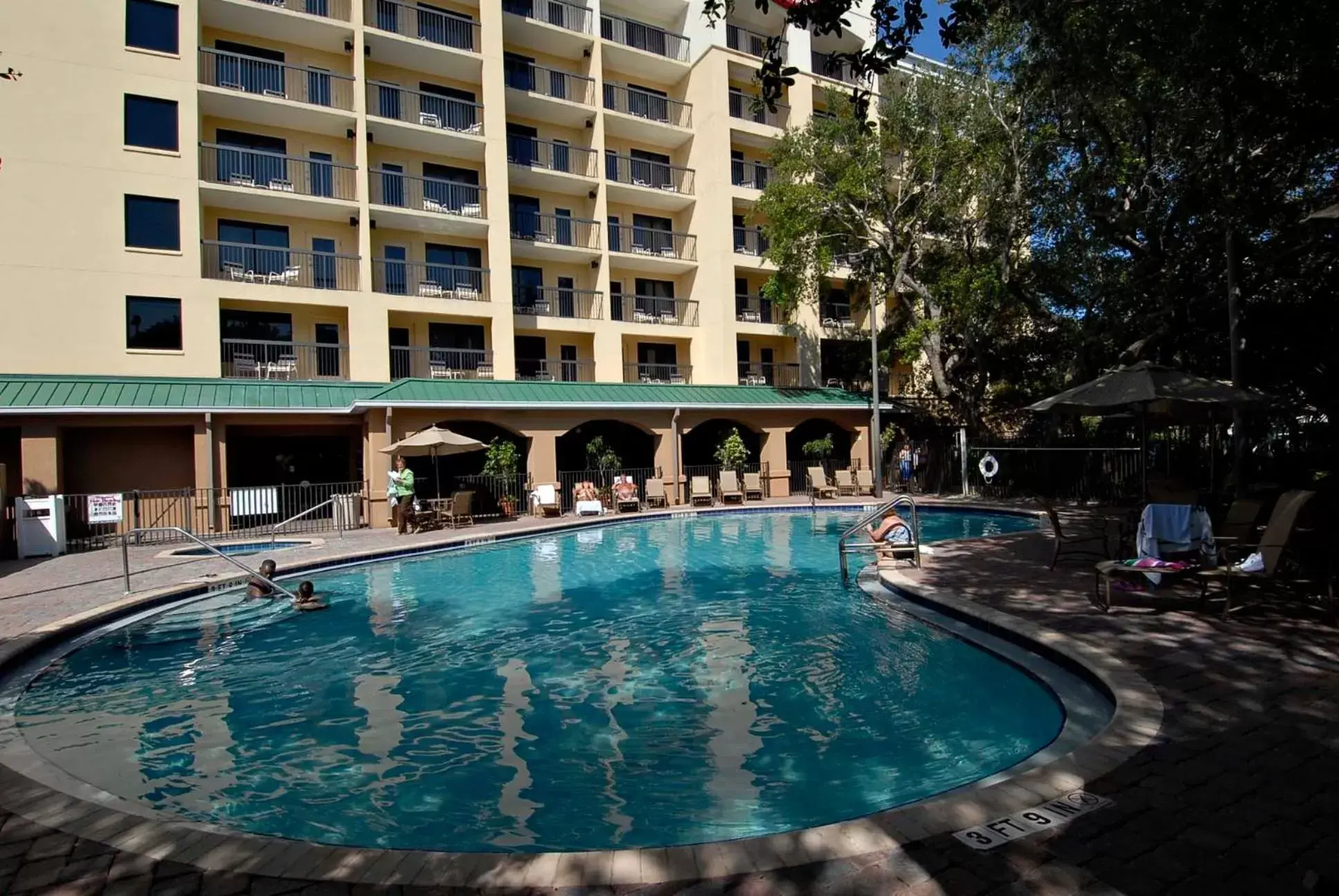 Property building, Swimming Pool in Courtyard by Marriott Cocoa Beach Cape Canaveral
