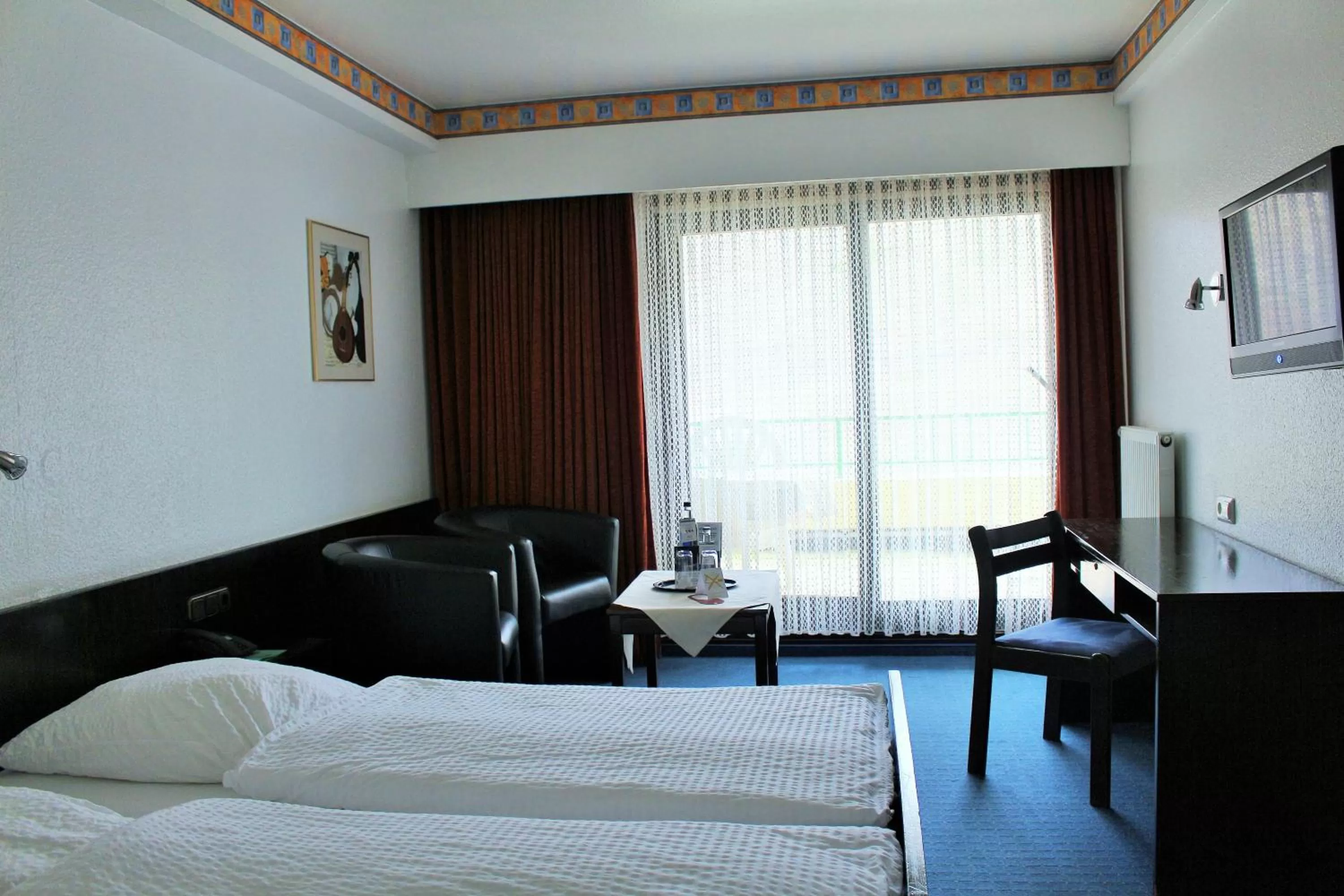 Photo of the whole room, Bed in Hotel Rheinlust