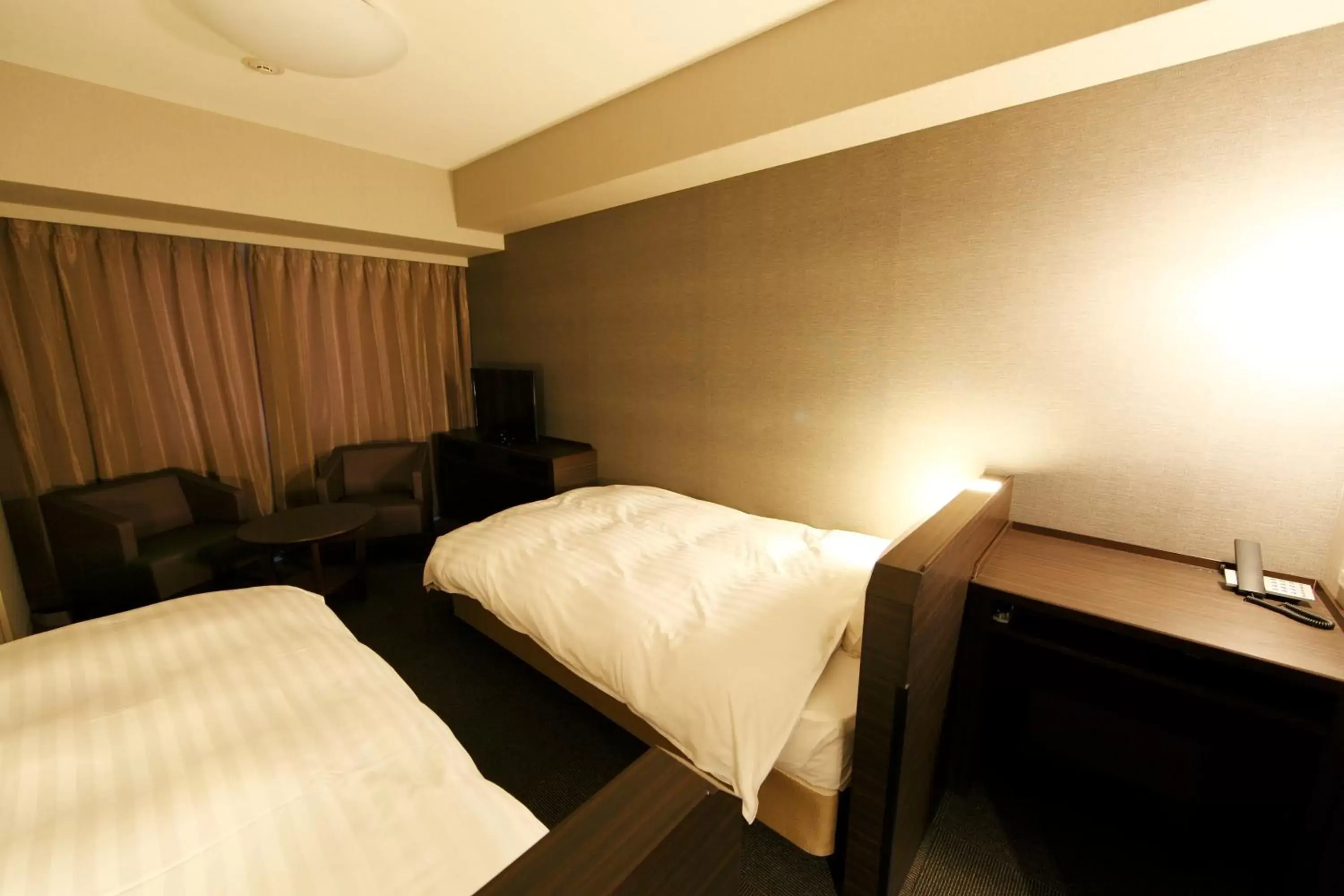 Bed in Dormy Inn Kagoshima