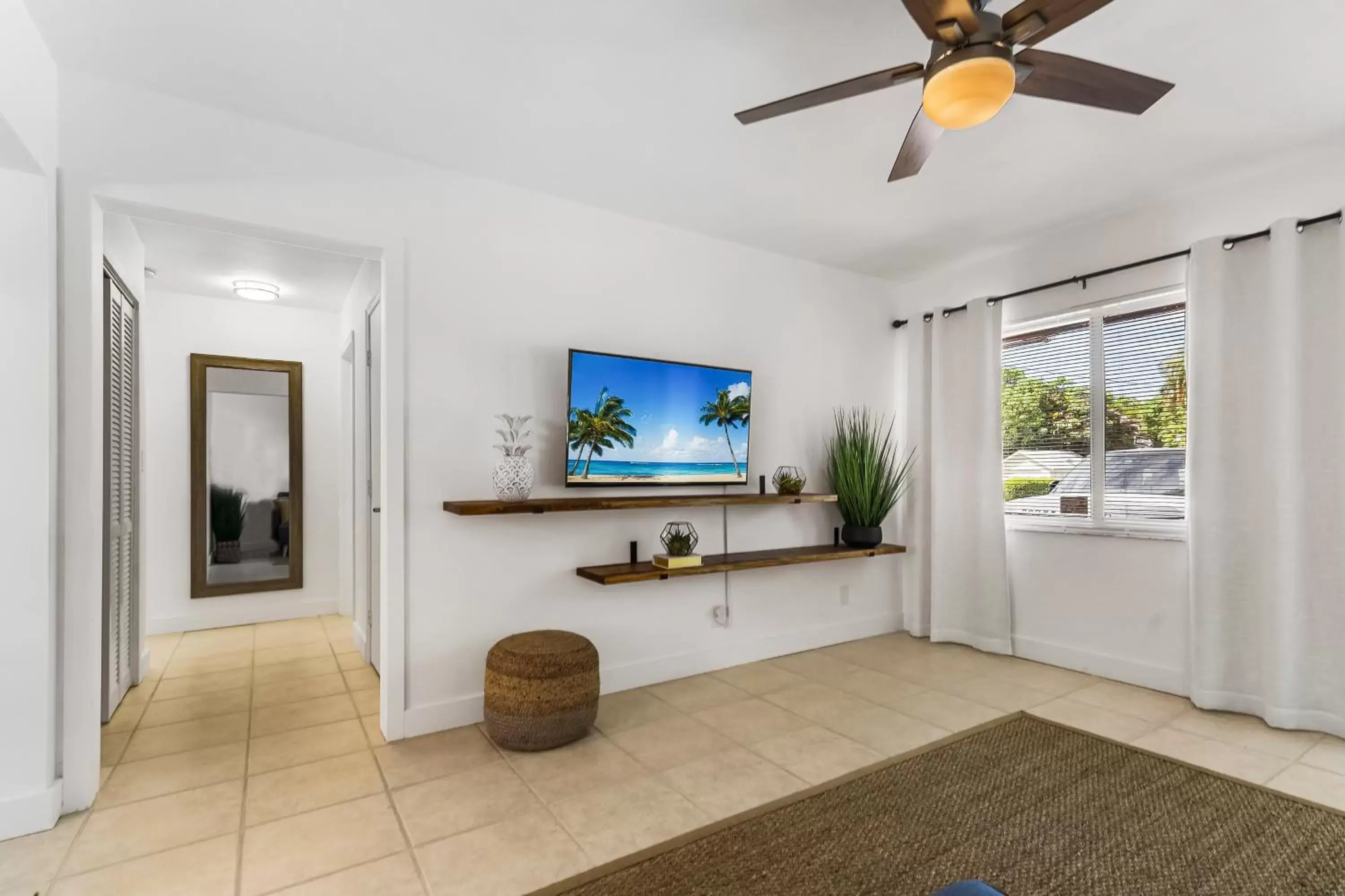 Living room, TV/Entertainment Center in Alani Bay Premium Condos