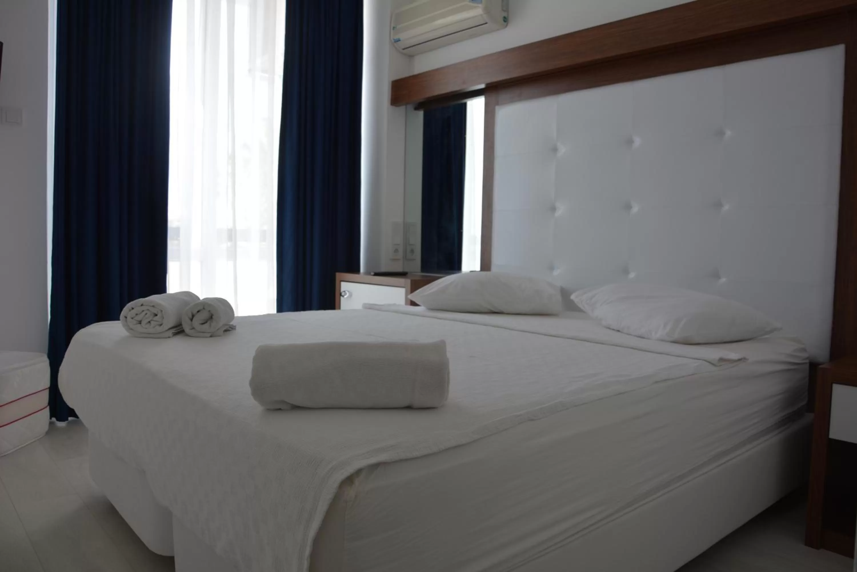 Bed, Room Photo in Asena Hotel