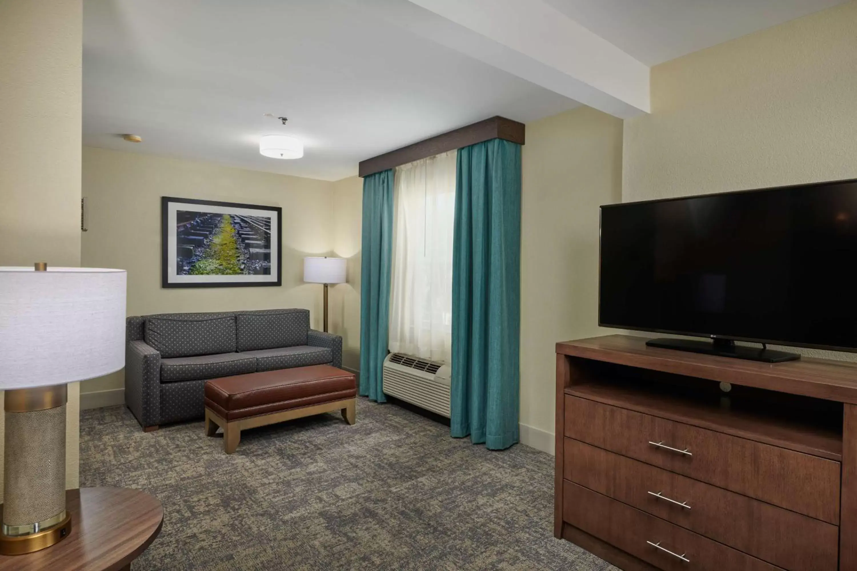 Bedroom, TV/Entertainment Center in Homewood Suites by Hilton Sarasota