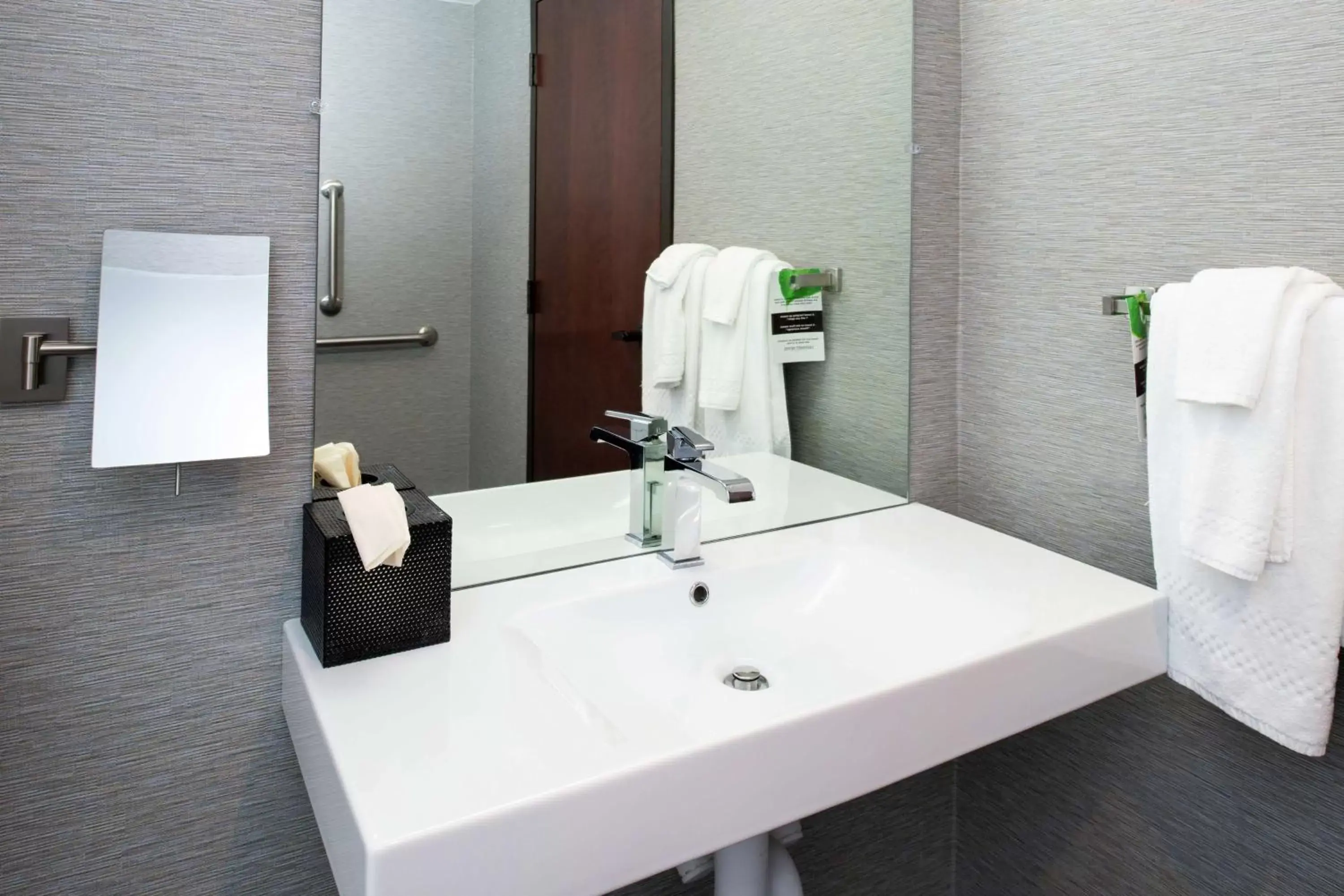 Bathroom in Joinery Hotel Pittsburgh, Curio Collection by Hilton