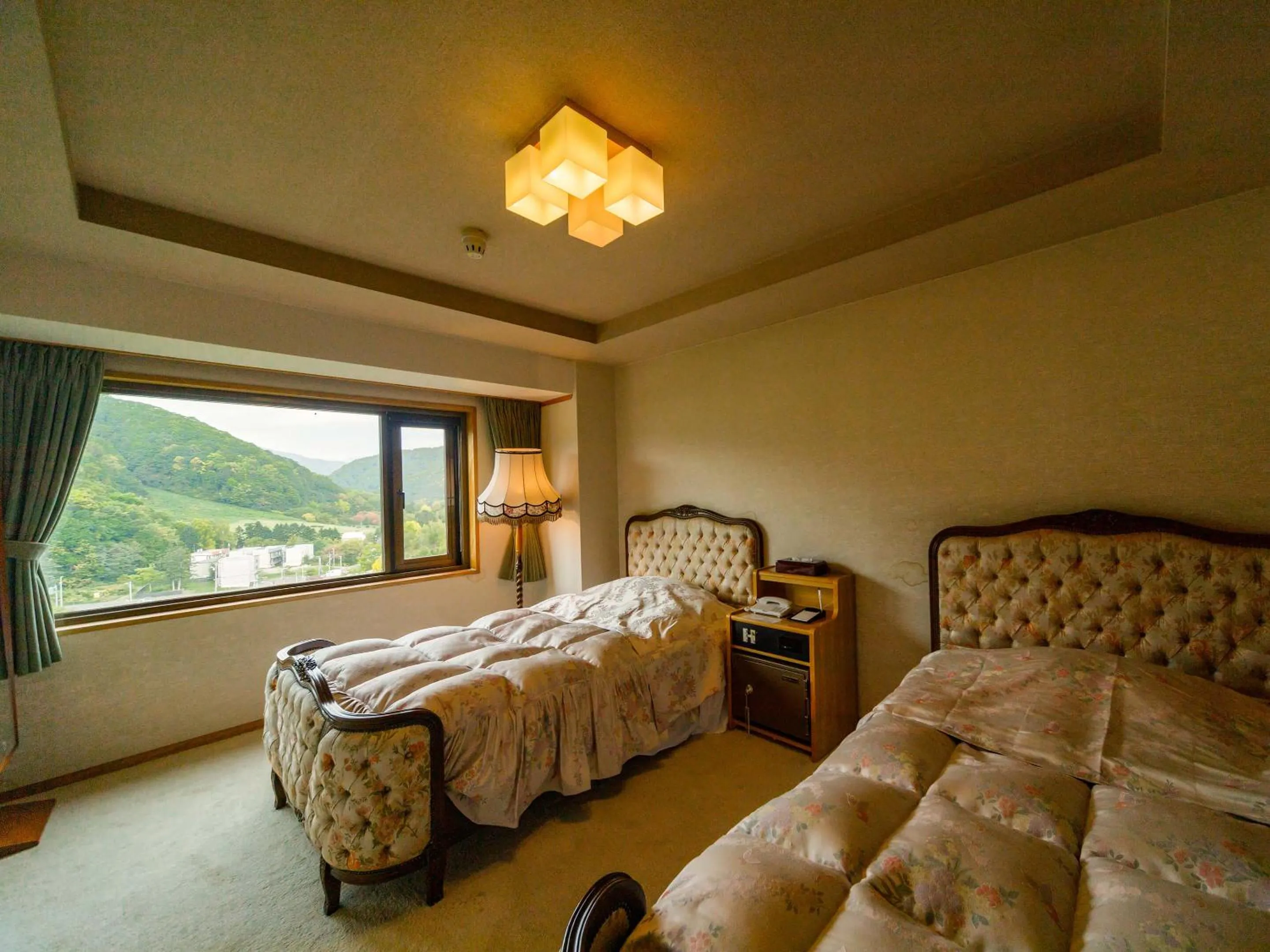 Living room, Bed in Jozankei View Hotel