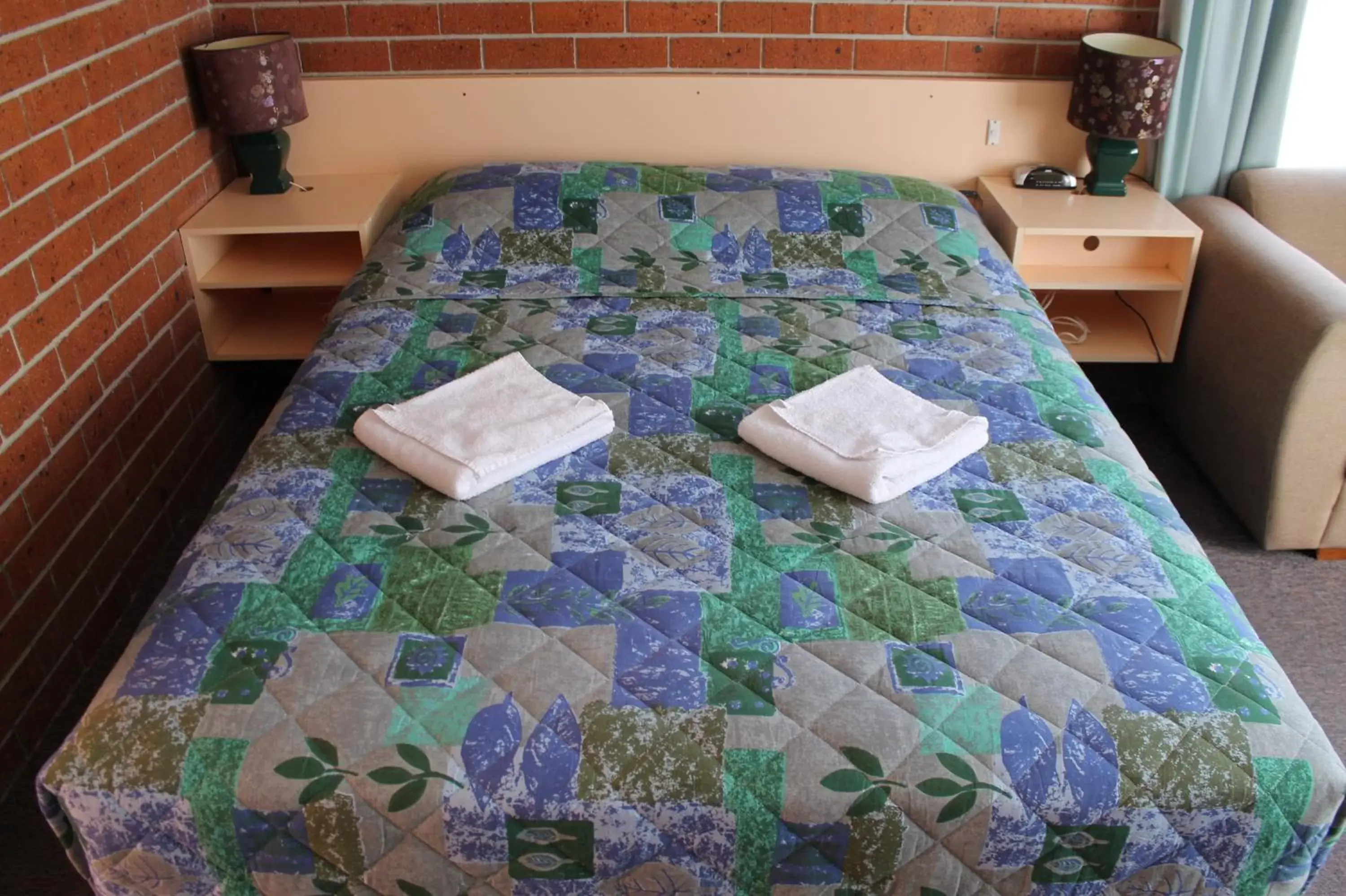 Bed in Greenslopes Motor Inn