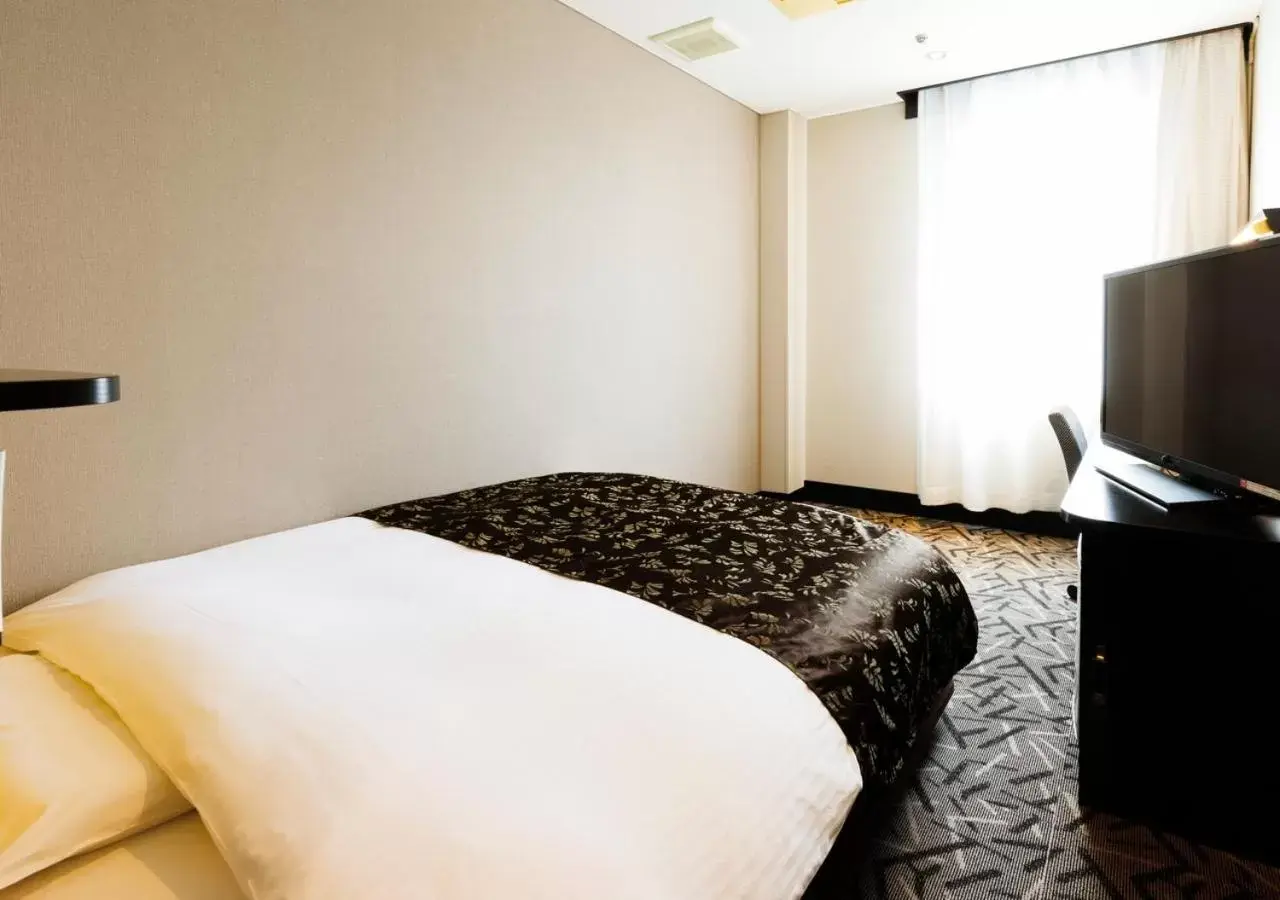 Photo of the whole room, Bed in APA Hotel Fukuoka Yukuhashi Ekimae