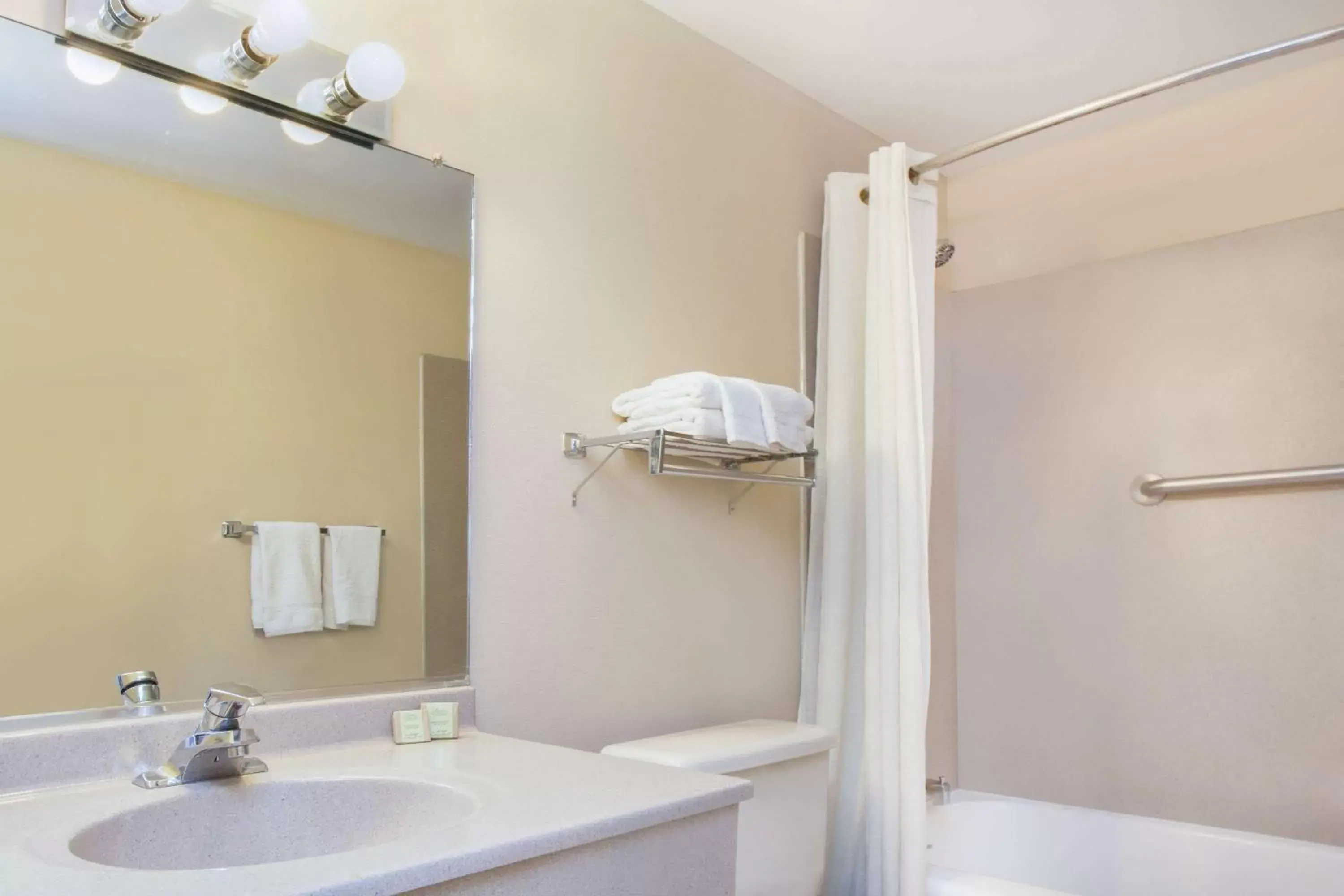 Bathroom in Super 8 by Wyndham Chicago/Rosemont/O'Hare/SE