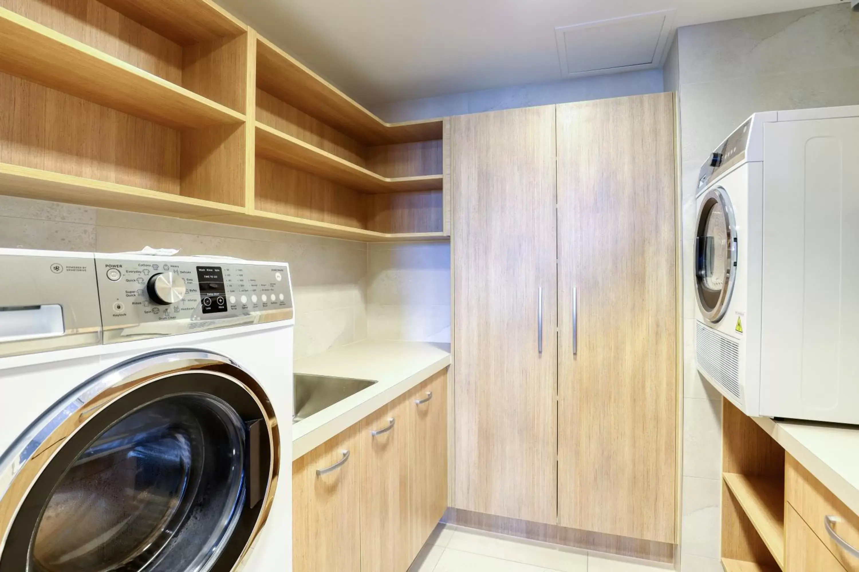 washing machine, Kitchen/Kitchenette in Ramada Suites by Wyndham Nautilus Orewa