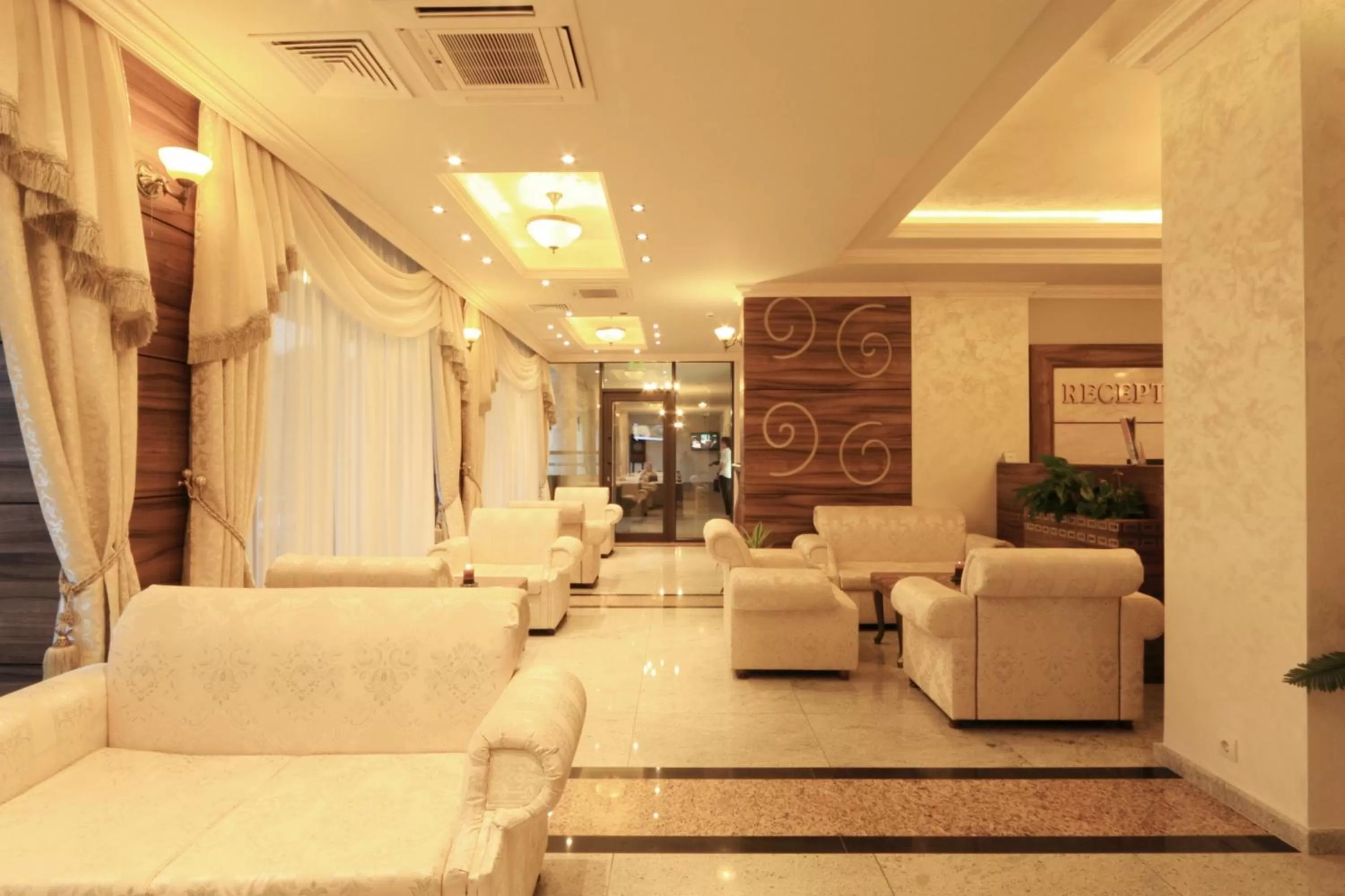 Lobby or reception in Penelopa Palace Apart Hotel & SPA