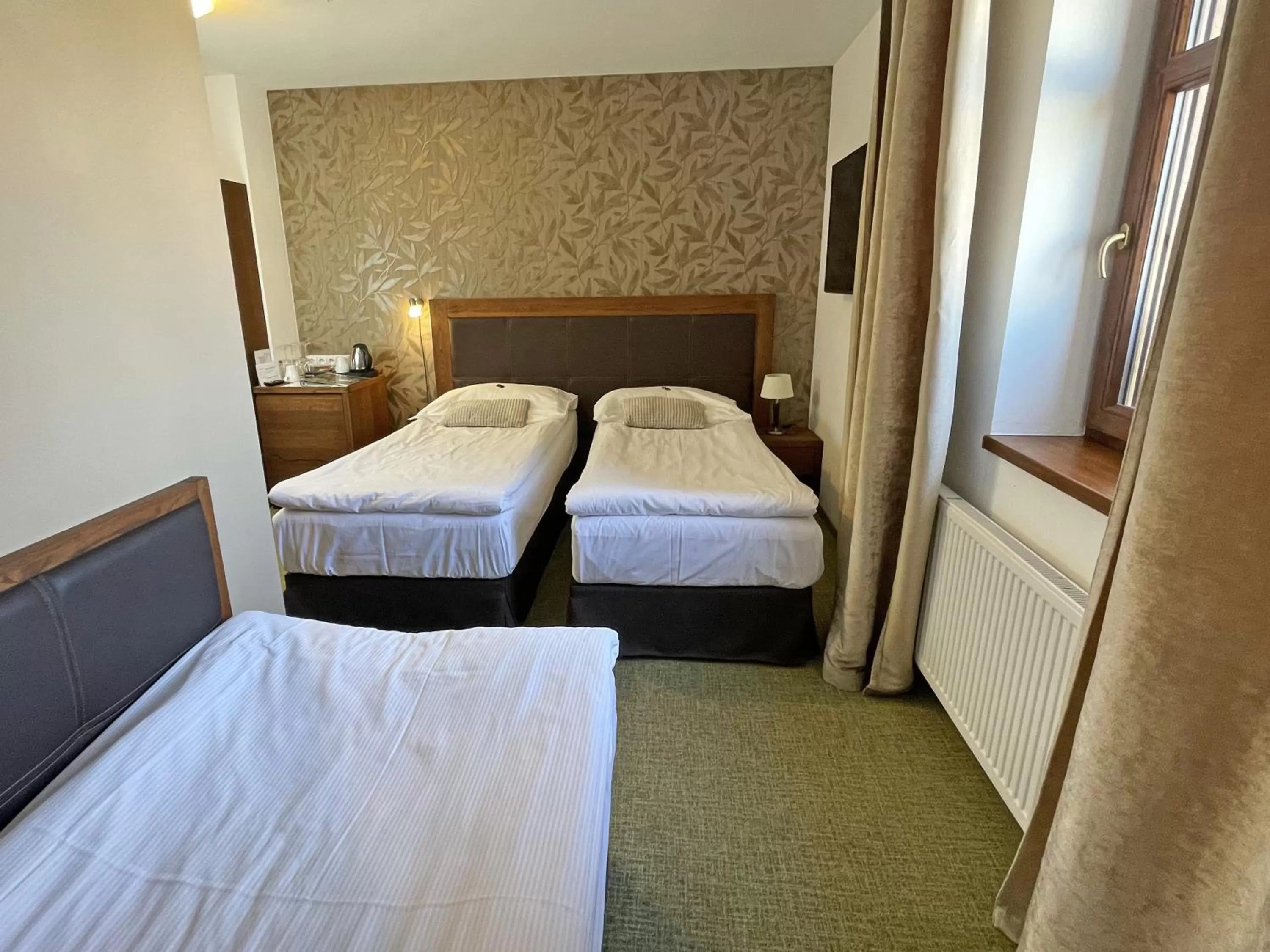 Bed in Hotel U Kvapilů