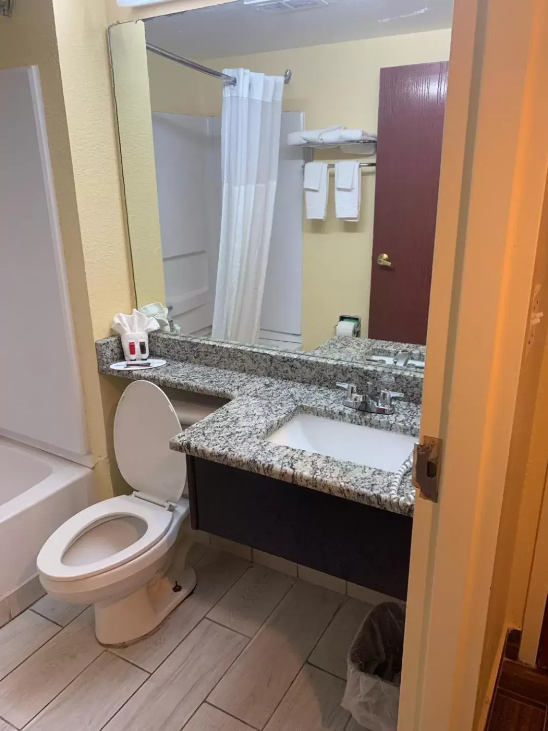 Bathroom in Days Inn & Suites by Wyndham Tampa/Raymond James Stadium