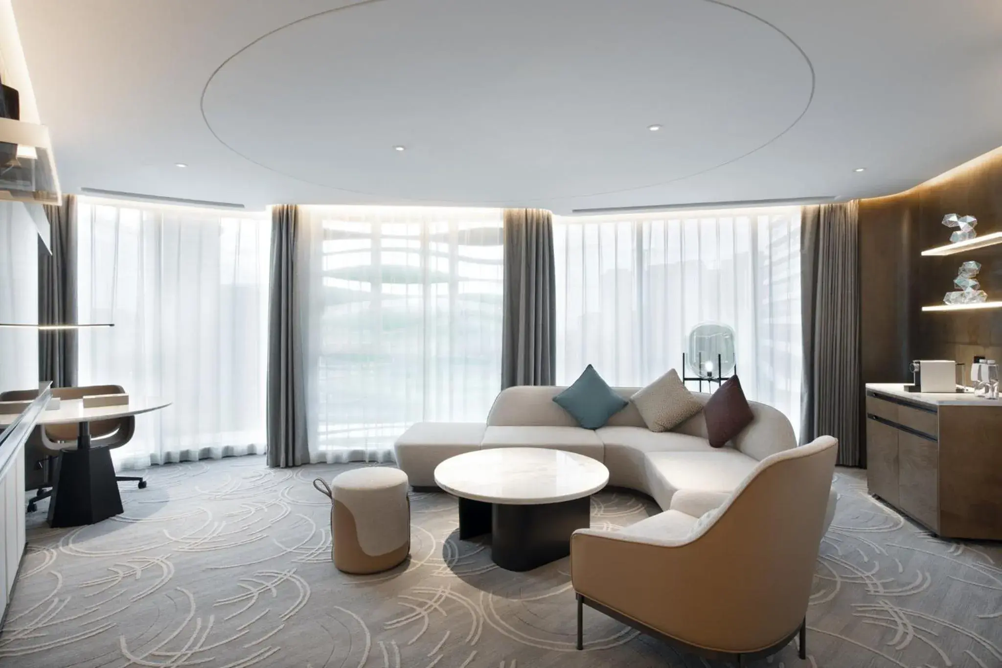 Photo of the whole room, Seating Area in Crowne Plaza Wuhan Optics Valley, an IHG Hotel