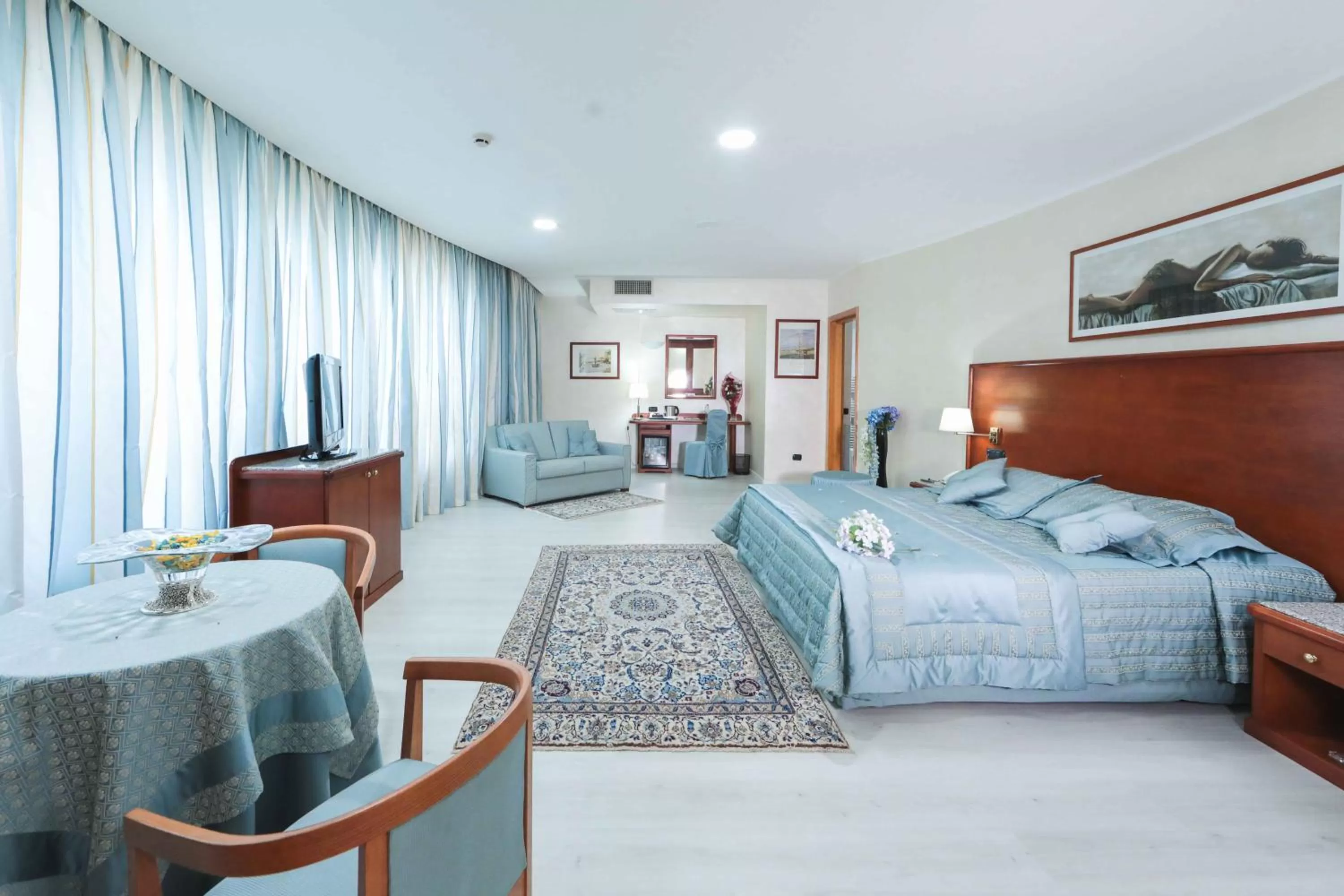 Bed in Edra Palace Hotel & Ristorante