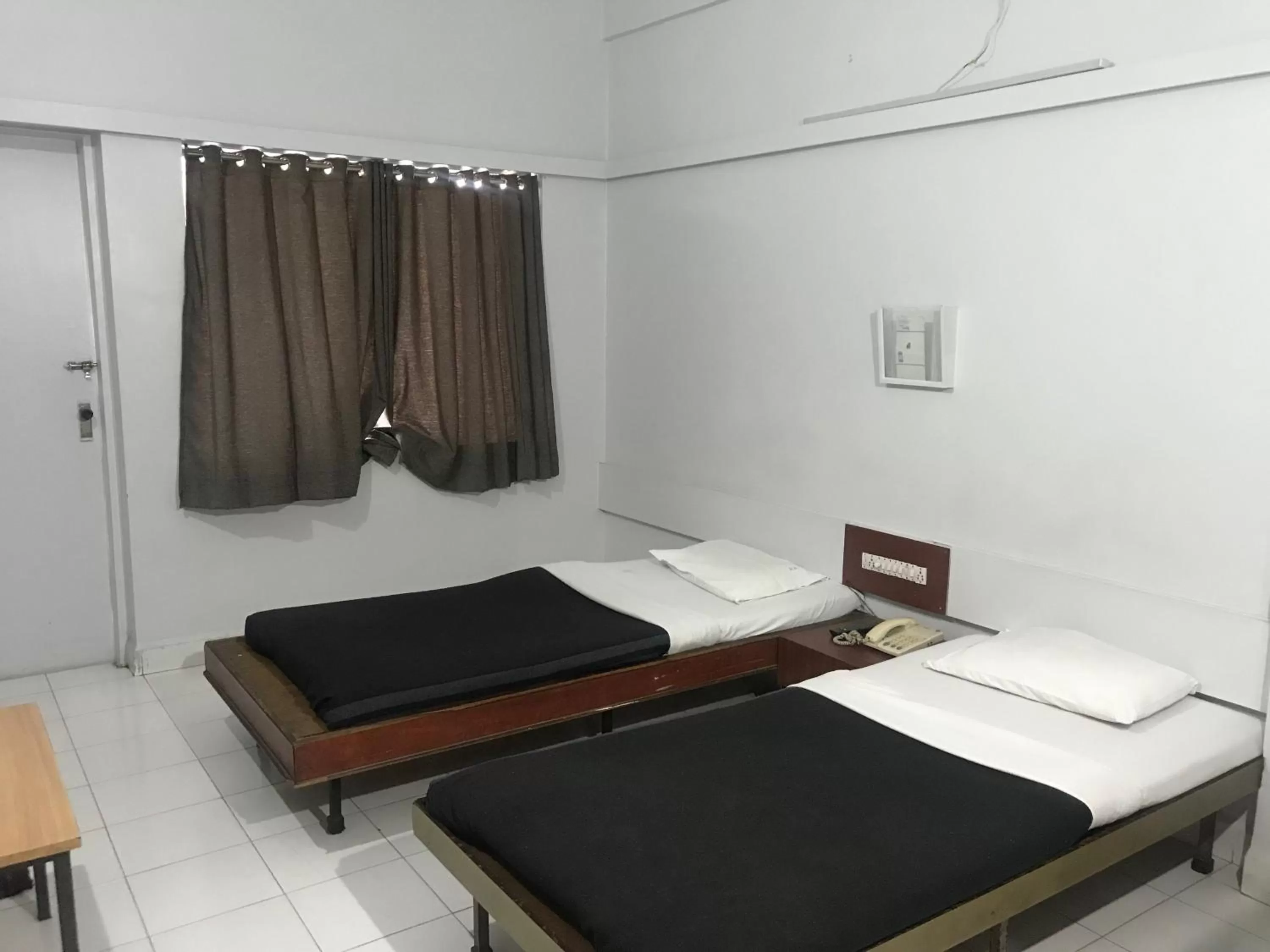 Photo of the whole room, Bed in Maurya Residency