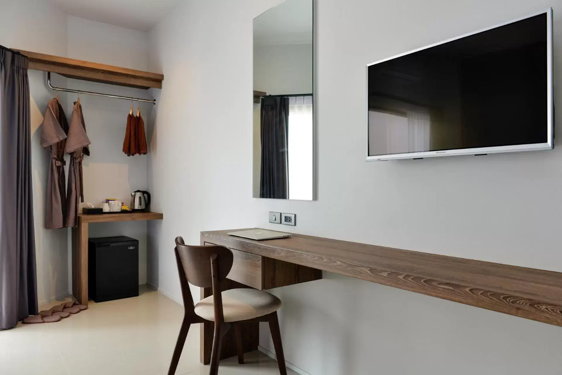 Bedroom, TV/Entertainment Center in The Chill at Krabi Hotel