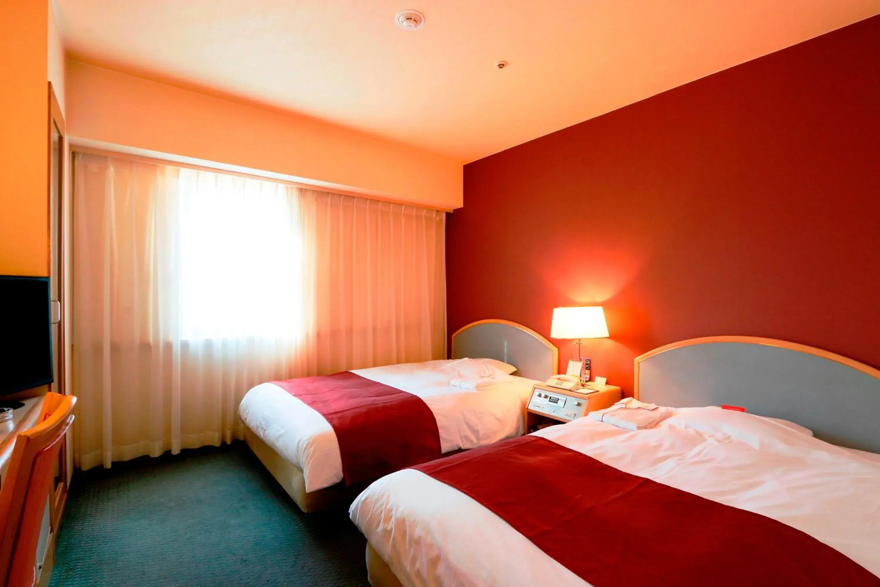 Photo of the whole room, Bed in Nest Hotel Matsuyama