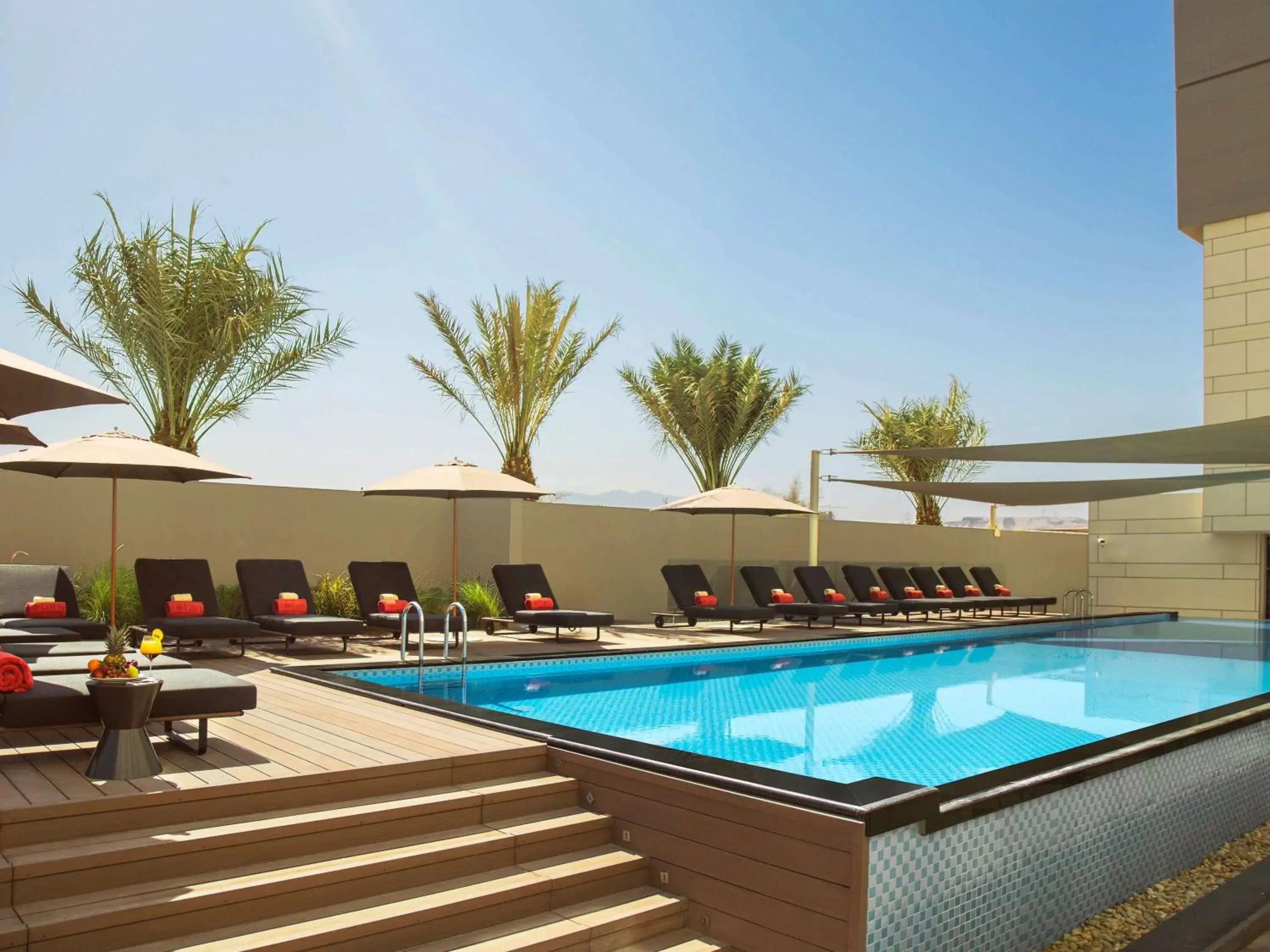 On site, Swimming Pool in Novotel Muscat Airport