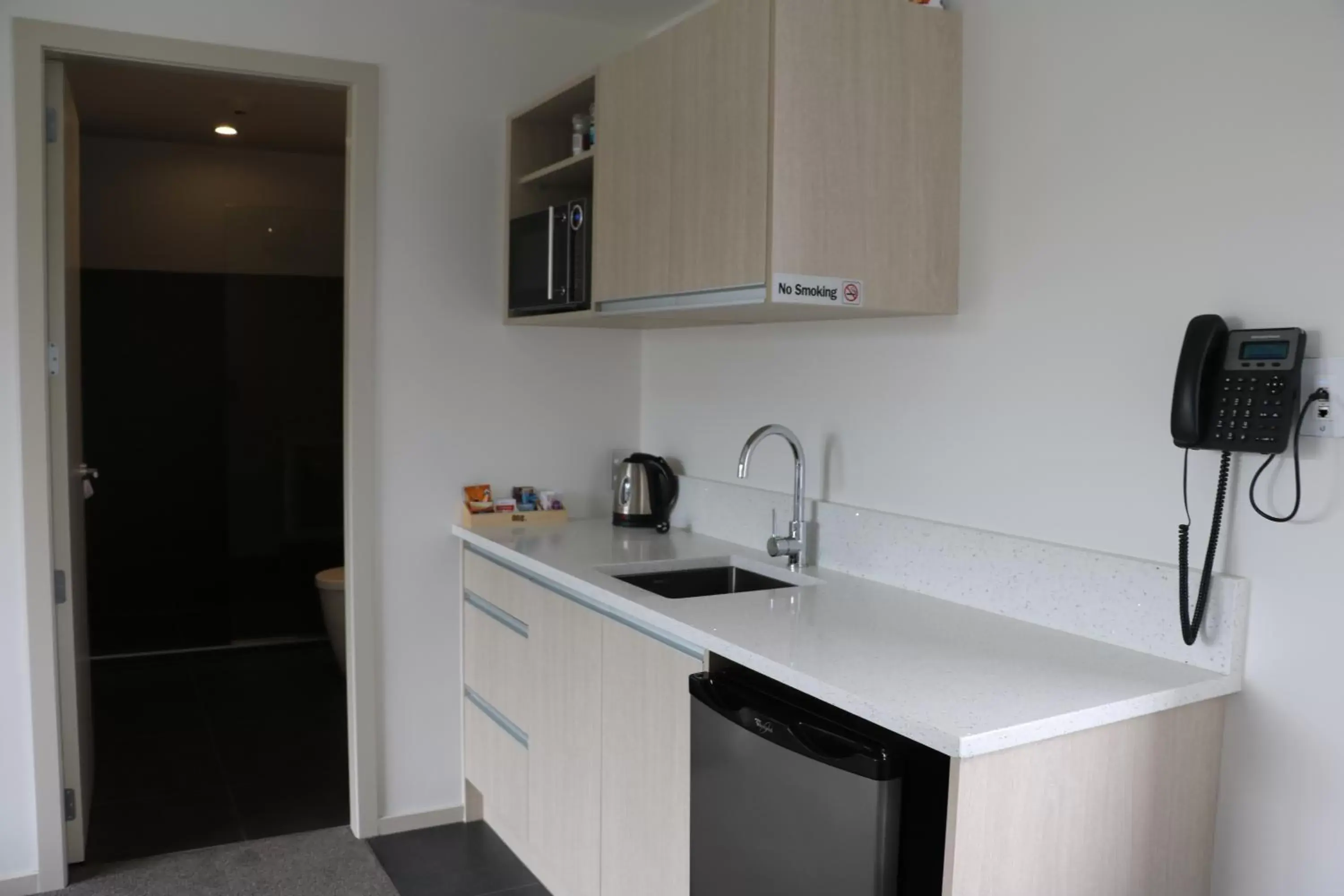 Kitchen/Kitchenette in MCM Motel Christchurch