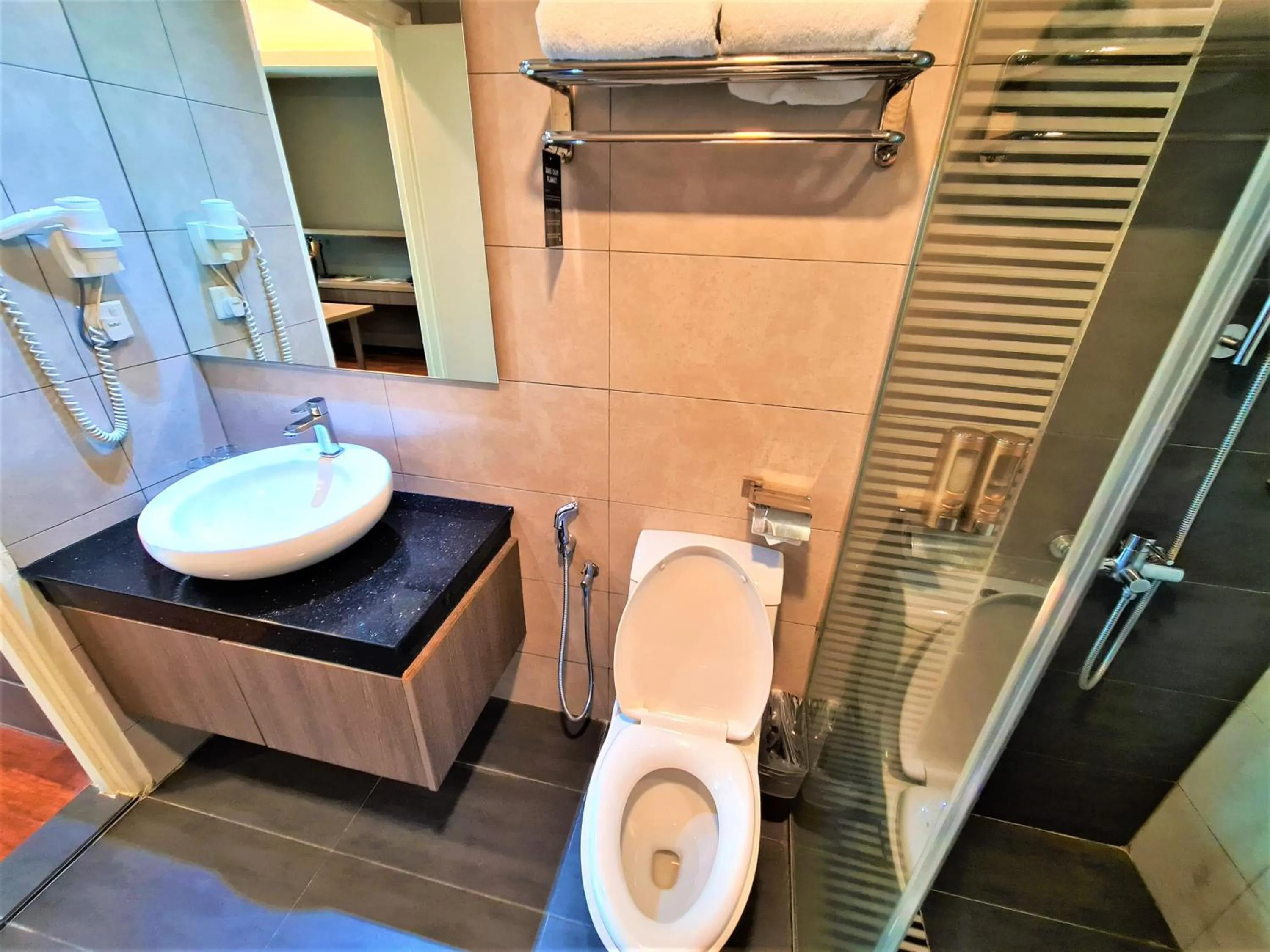 Shower in Nexus Regency Suites & Hotel