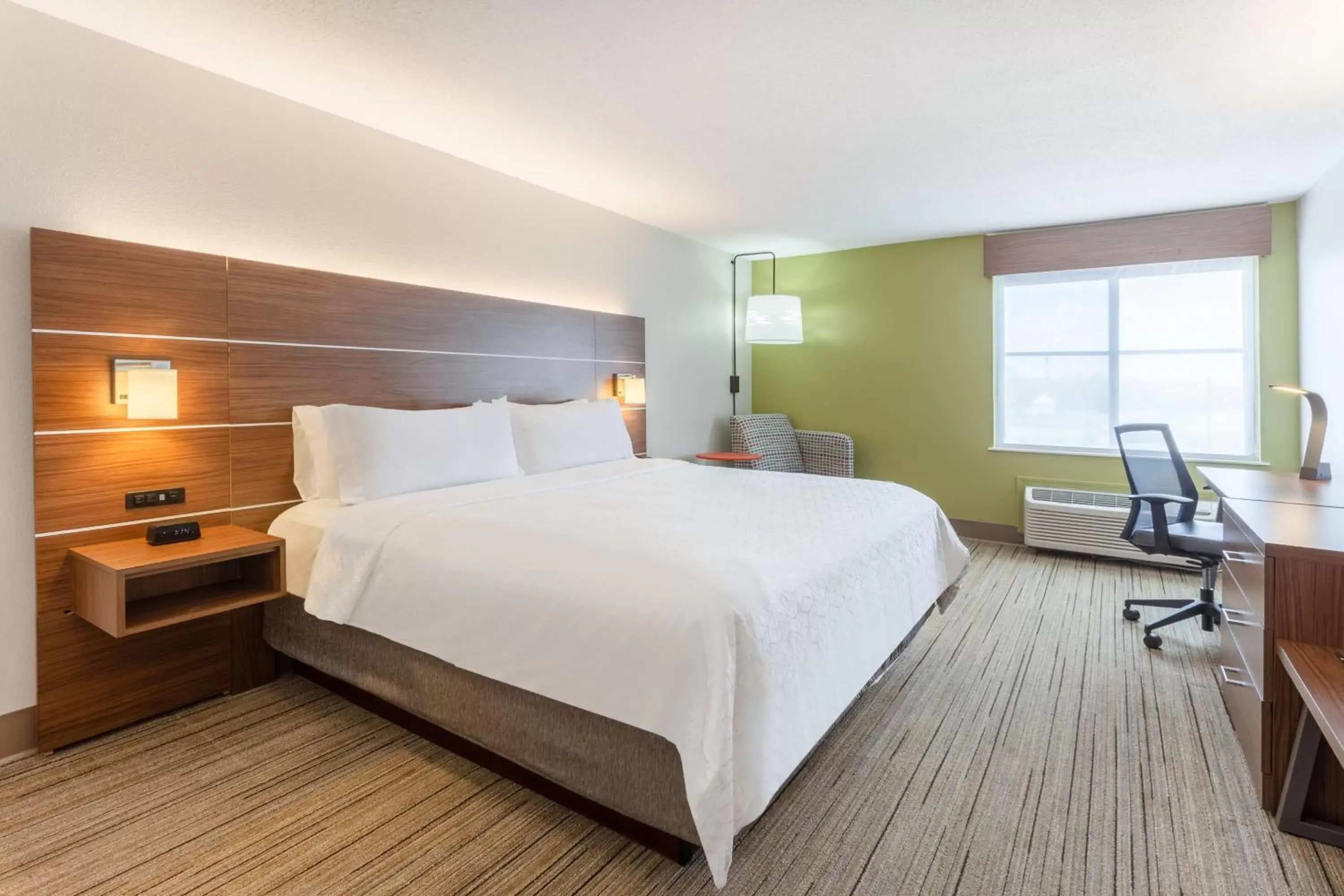 Bed in Holiday Inn Express Scottsburg, an IHG Hotel