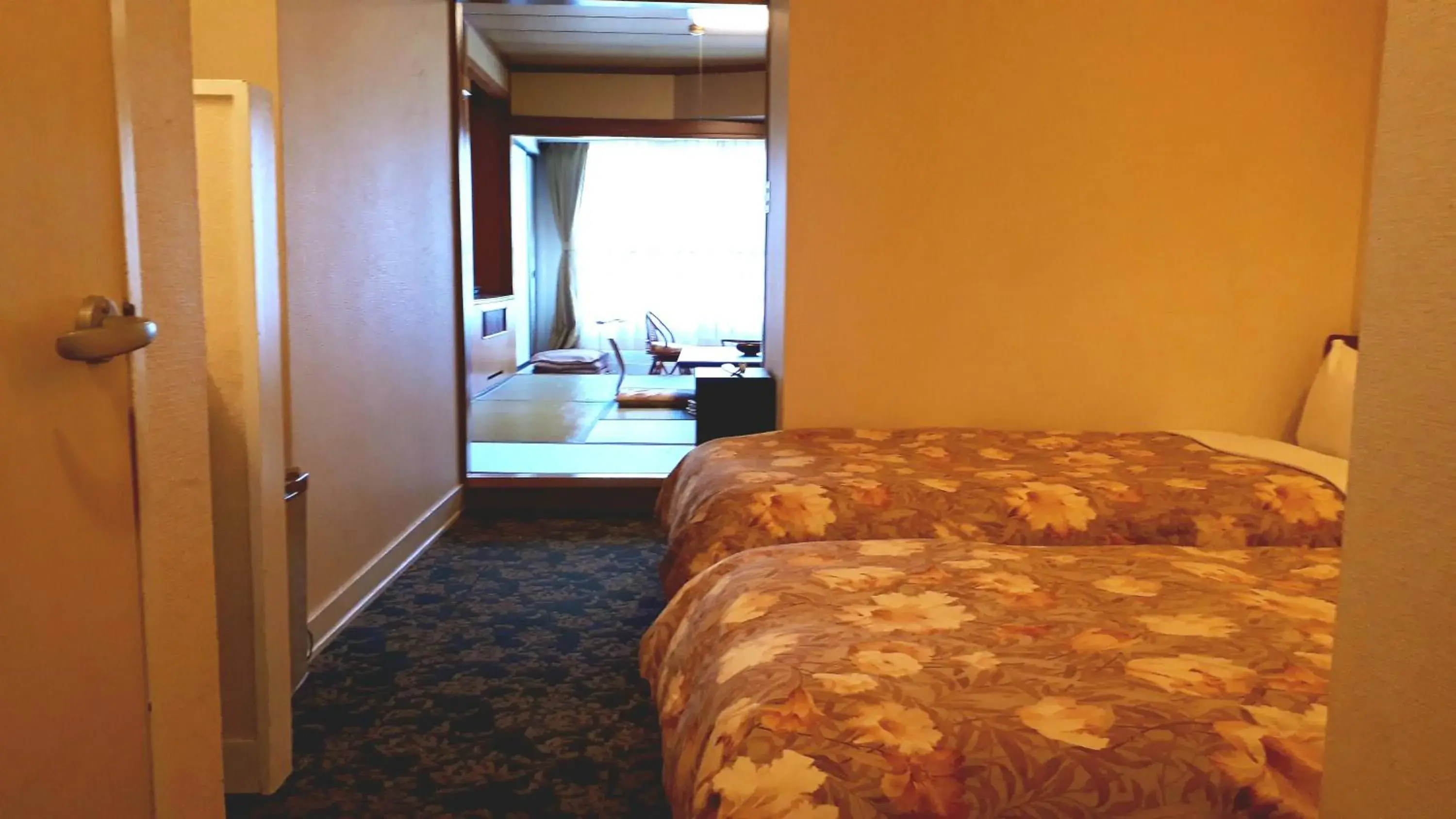 Bed in Lakeland Hotel Mizunosato