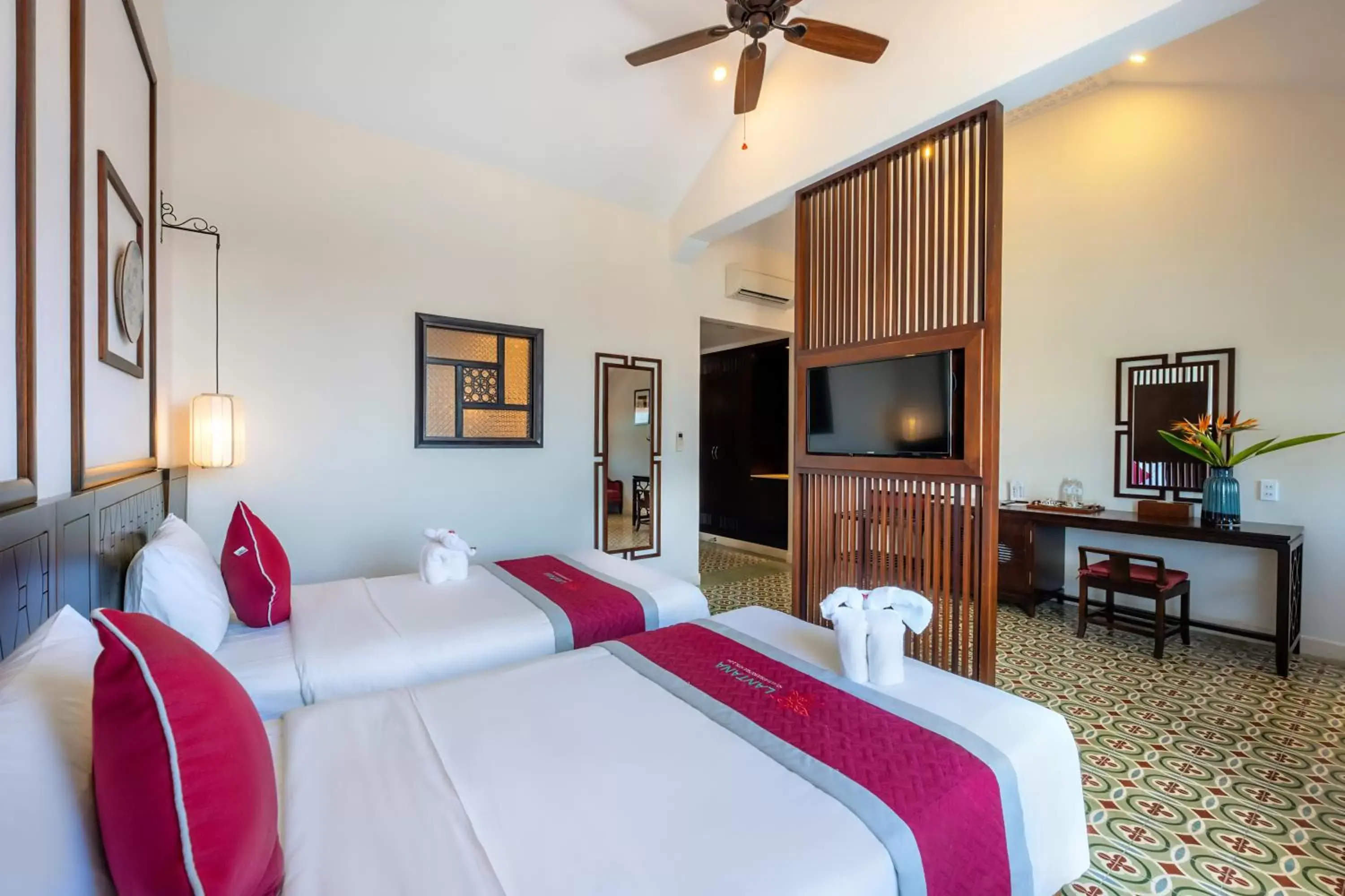 Bed in Lantana Riverside Hoi An Hotel & Spa