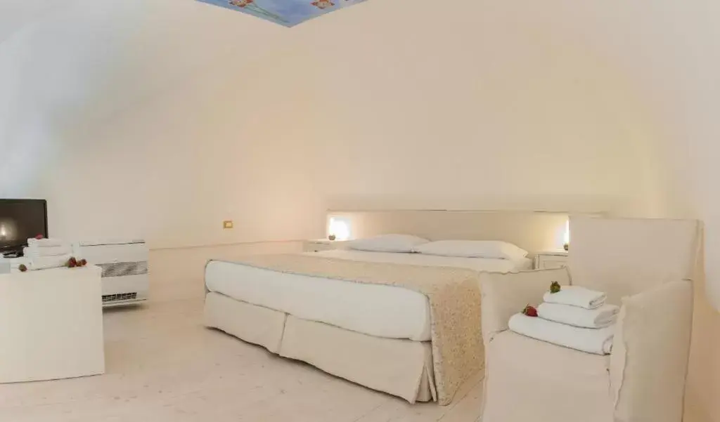 Bed in Dimora Dell'Osanna Raro Villas Smart Rooms Collection