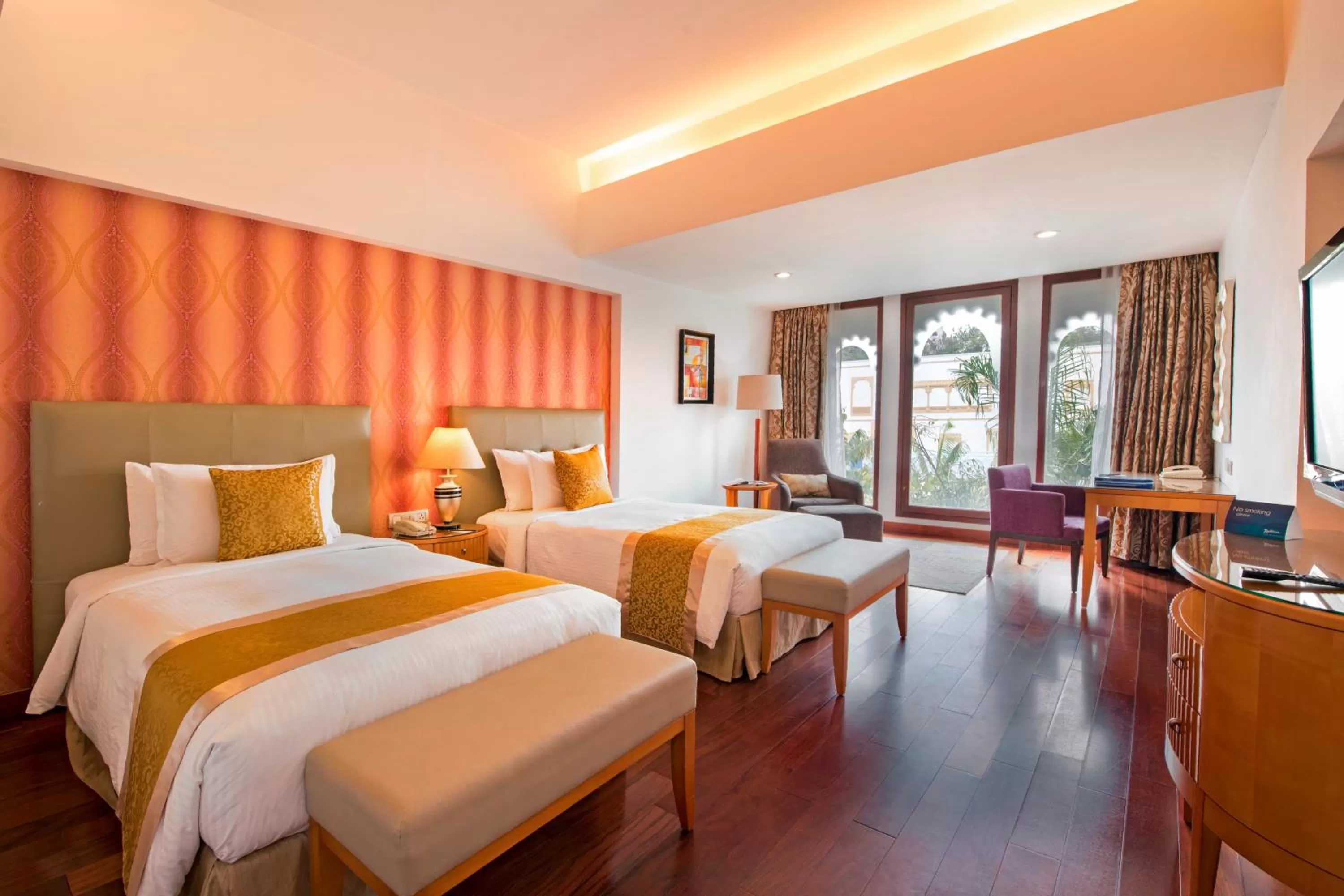 Photo of the whole room, Bed in Radisson Blu Udaipur Palace Resort & Spa