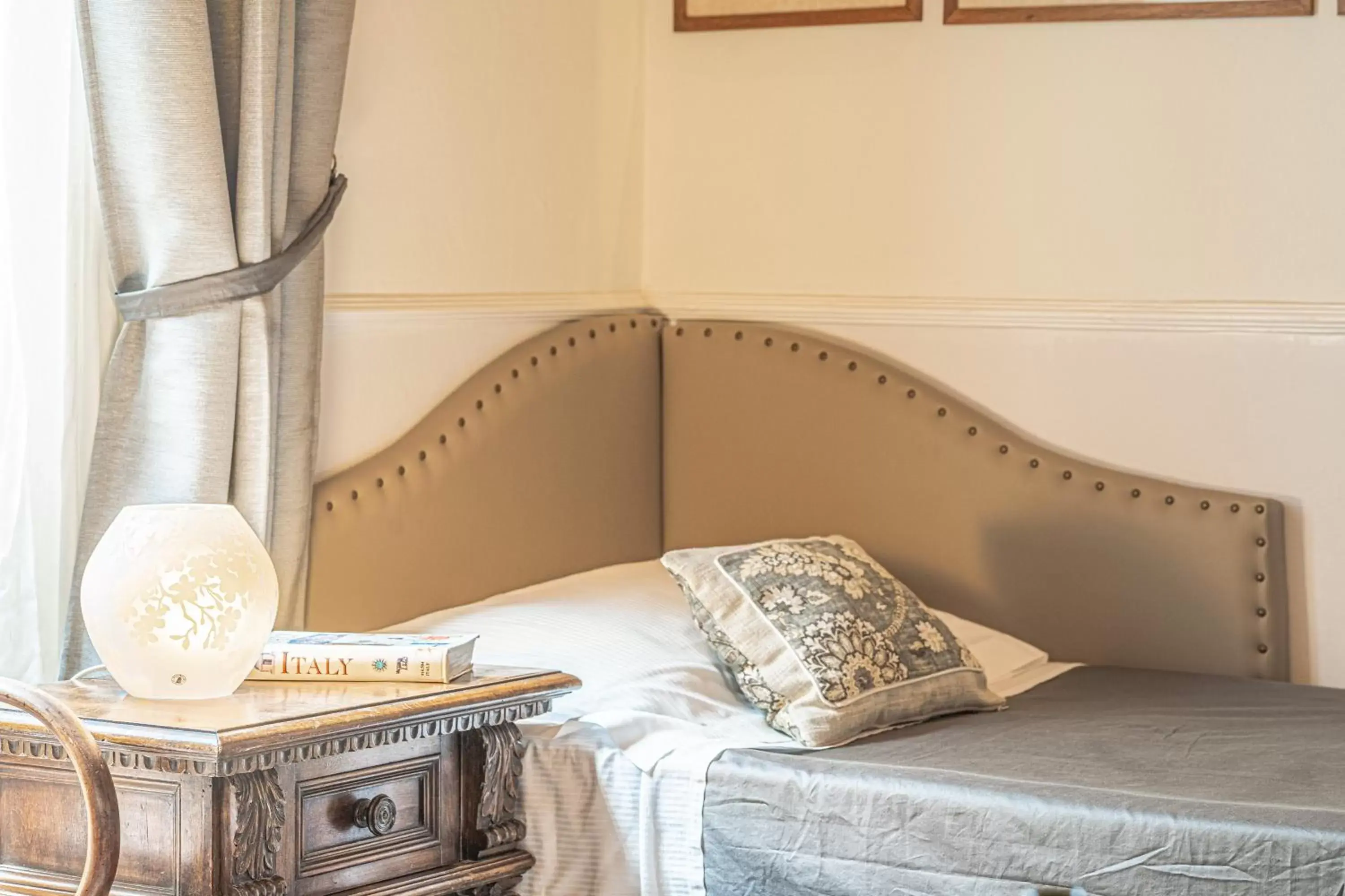 Bed in Relais & Maison Grand Tour