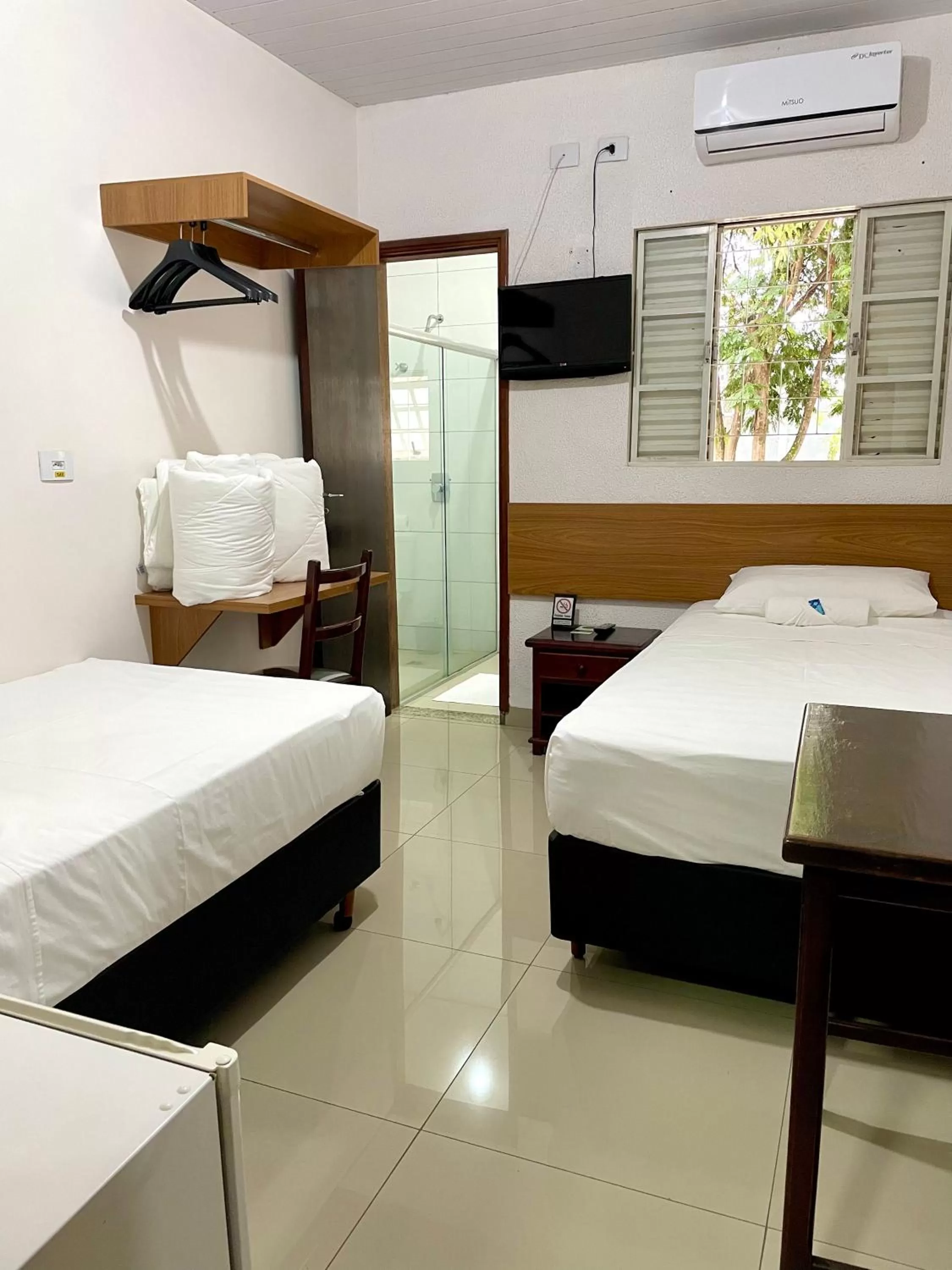 Bed in Nav Park Hotel