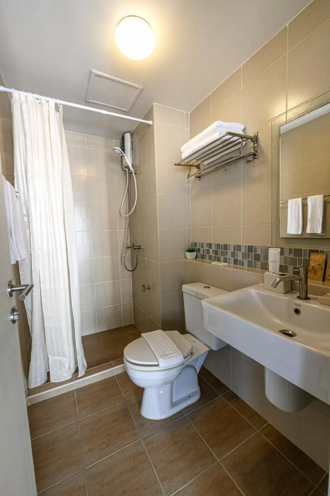 Bathroom in First Choice Suites SHA Plus Extra