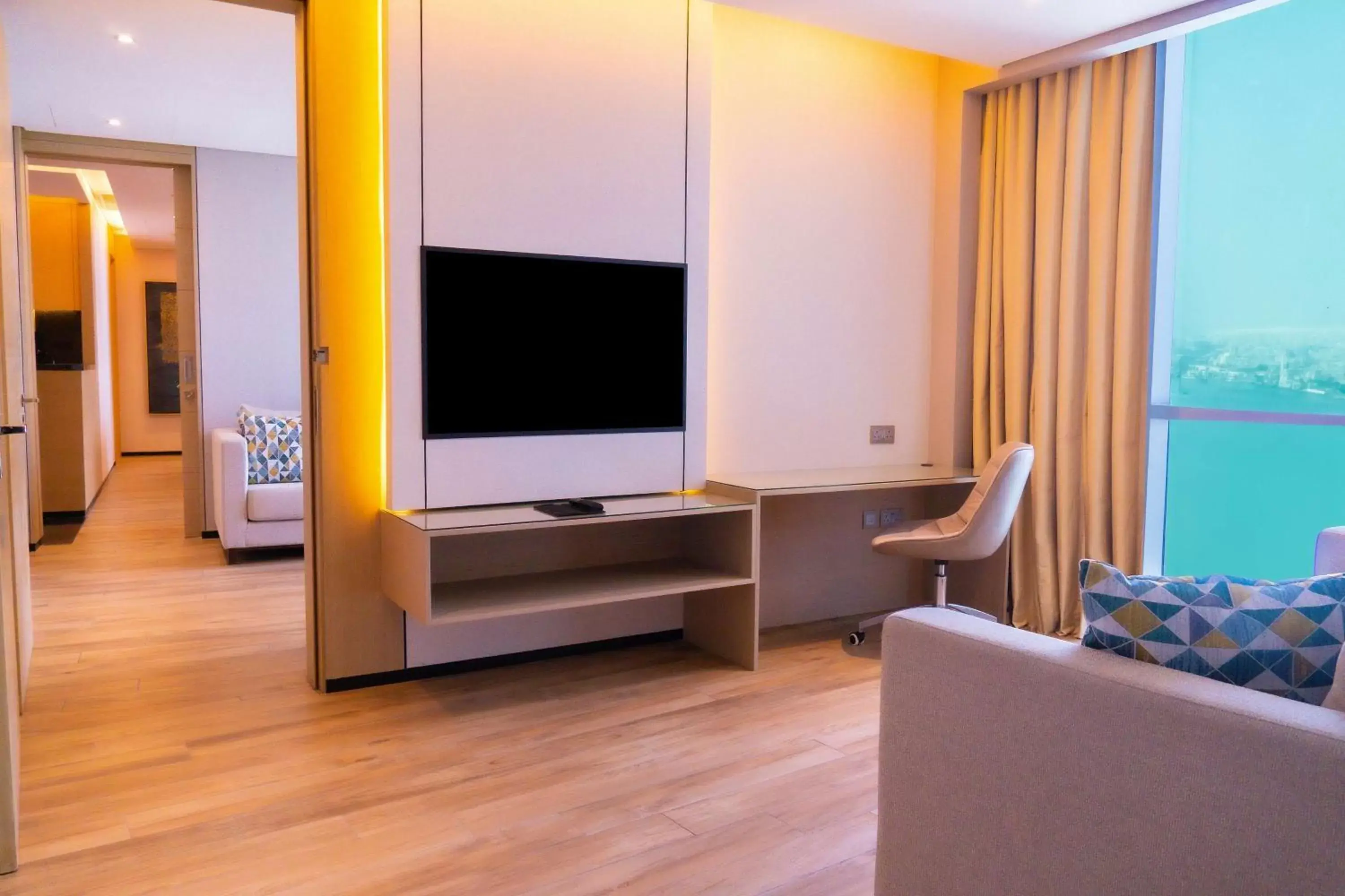 Bedroom, TV/Entertainment Center in Hilton Bahrain