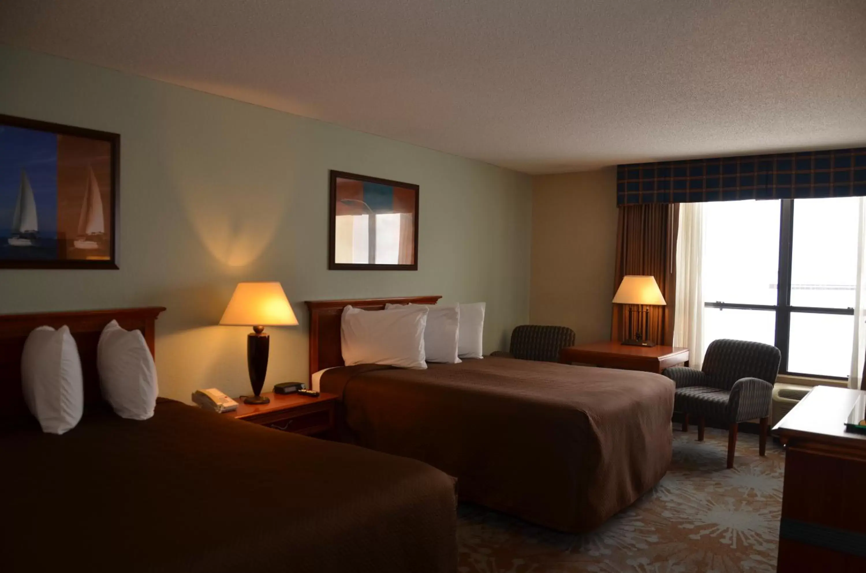 Bed in Tawas Bay Beach Resort & Conference Center