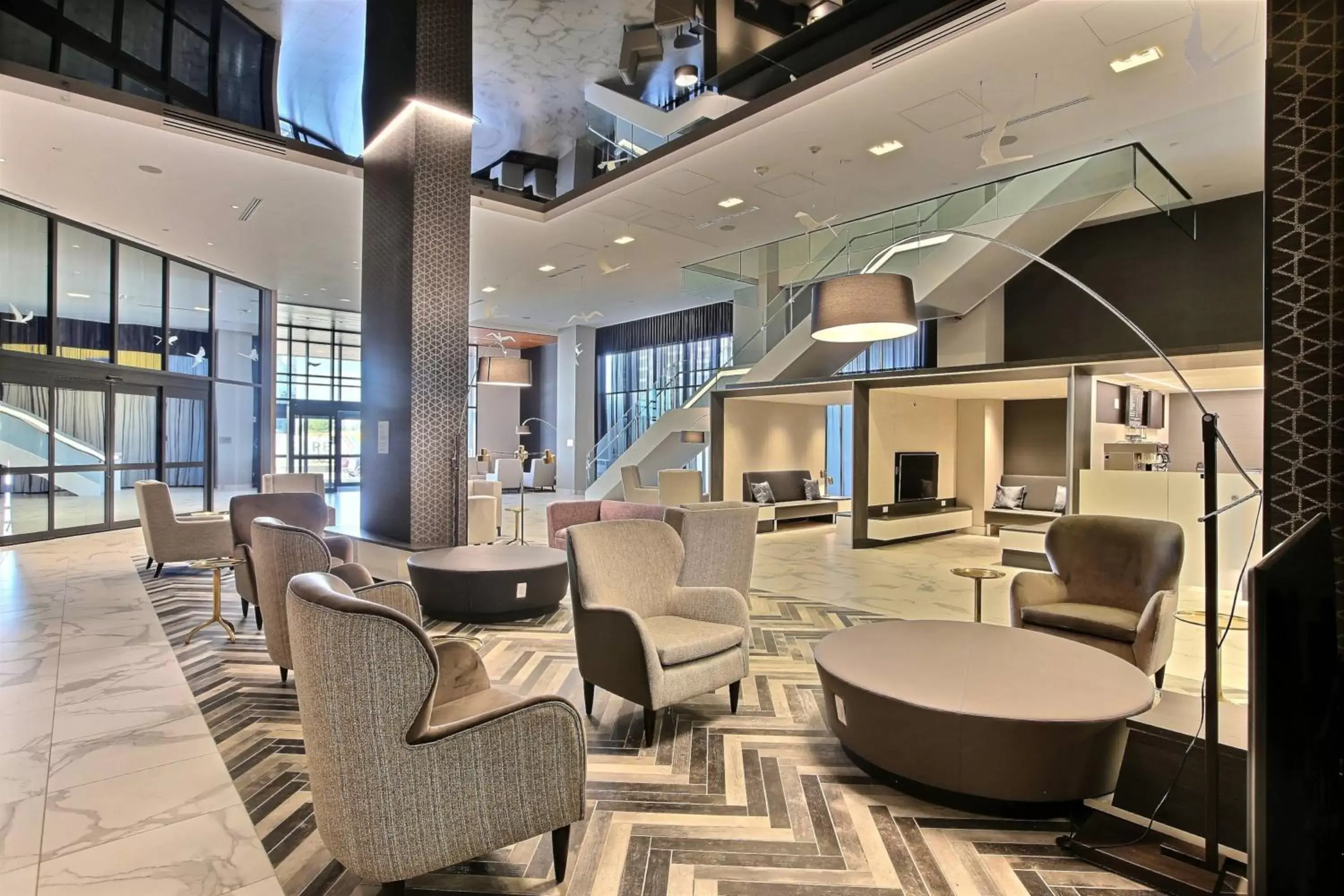 Lobby or reception, Lounge/Bar in Courtyard by Marriott Montreal Brossard
