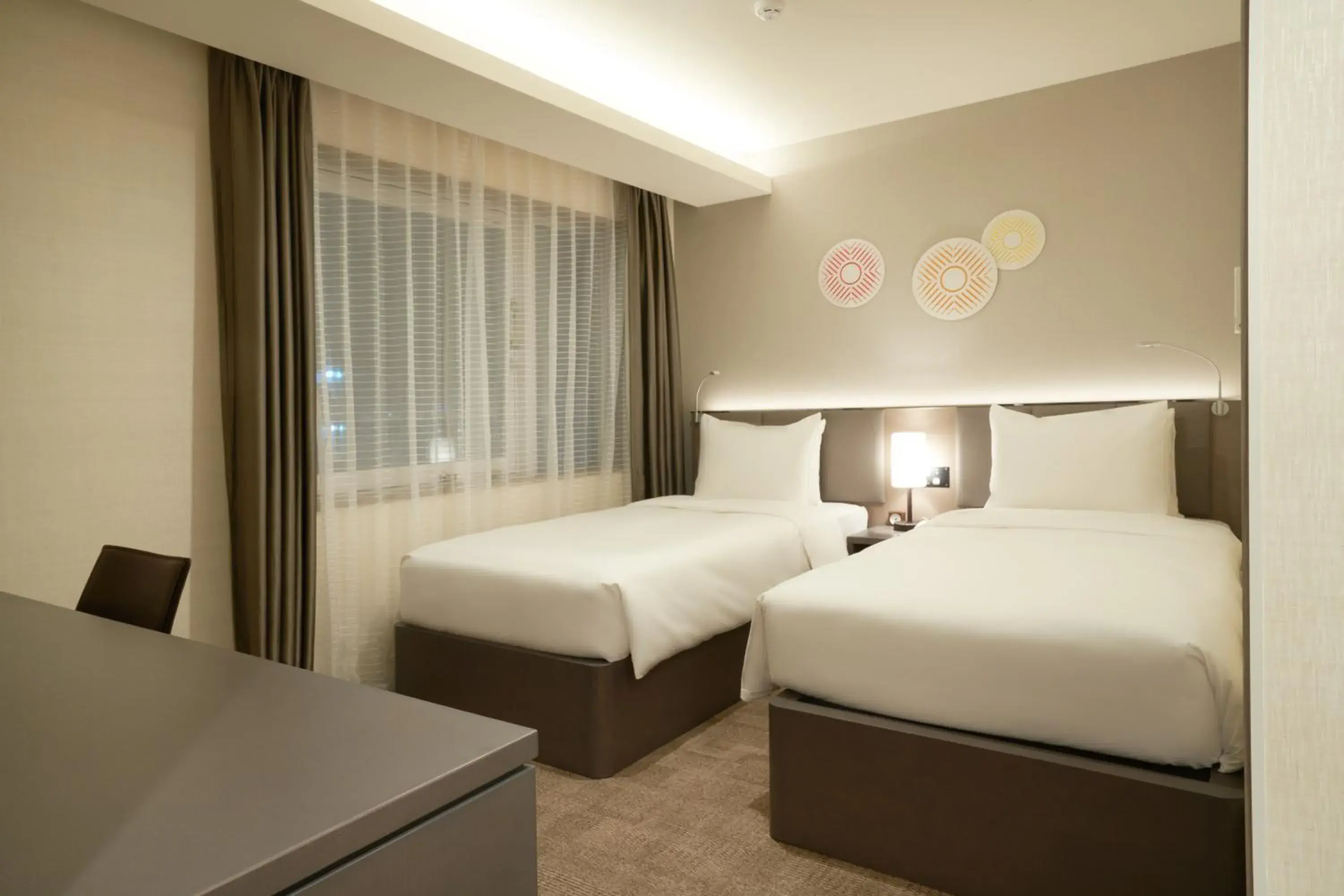 Photo of the whole room, Bed in Holiday Inn & Suites Shin Osaka, an IHG Hotel