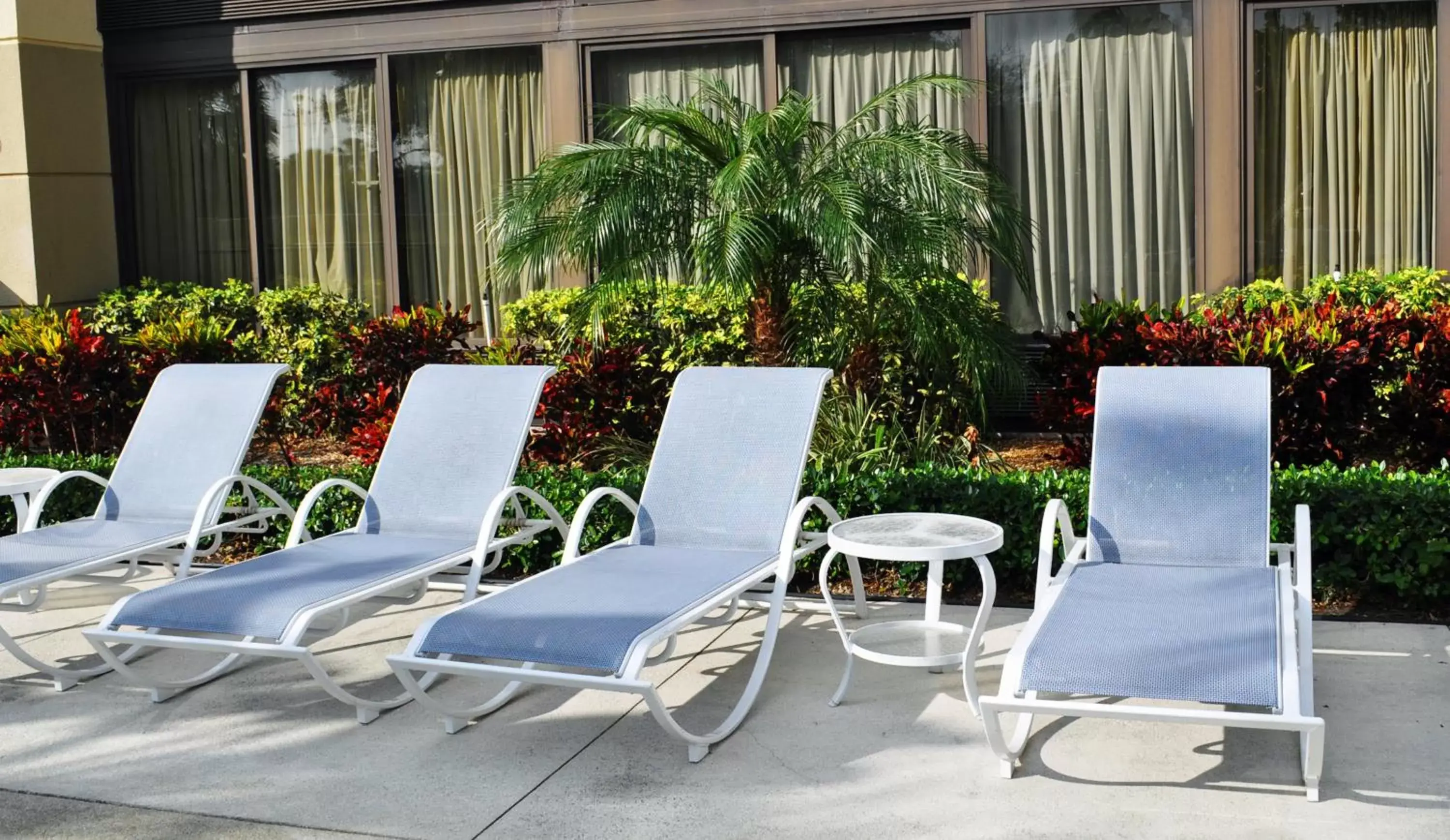 Swimming pool in Holiday Inn Express Boca Raton - West, an IHG Hotel